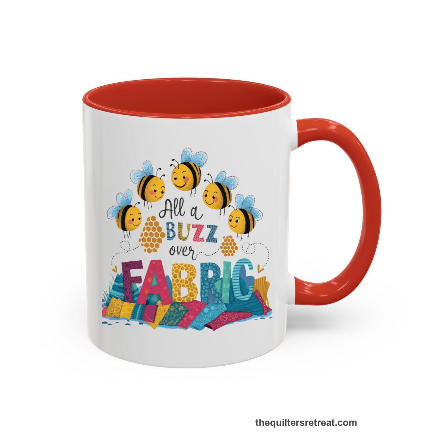 A Red Self-Fulfilled Accent Mug with a playful bees with "All a Buzz over Fabric" text and colorful fabric stacks