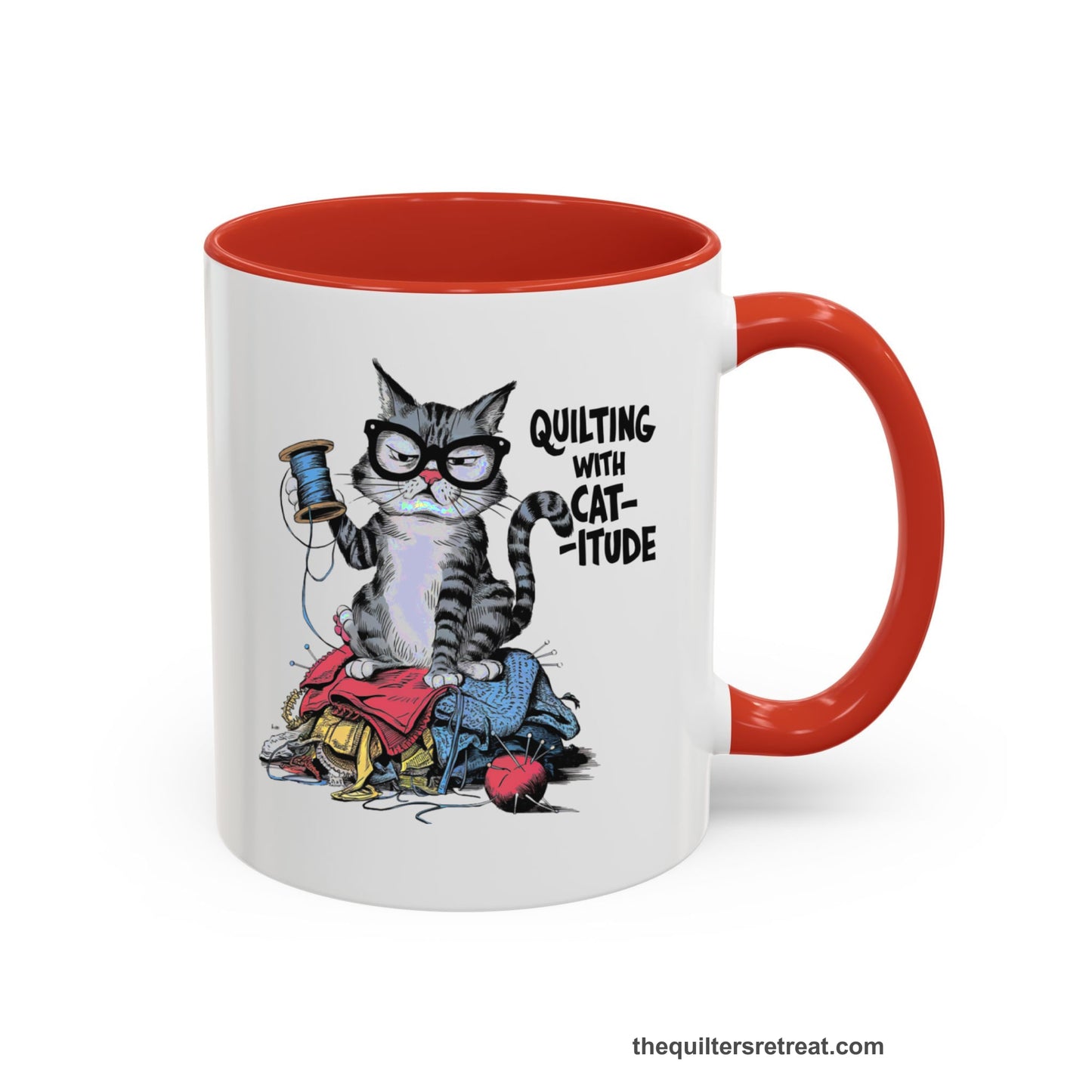 A Red Accent Ceramic Mug featuring Quilting with Catitude design with a grumpy cat holding thread spool atop fabric pile