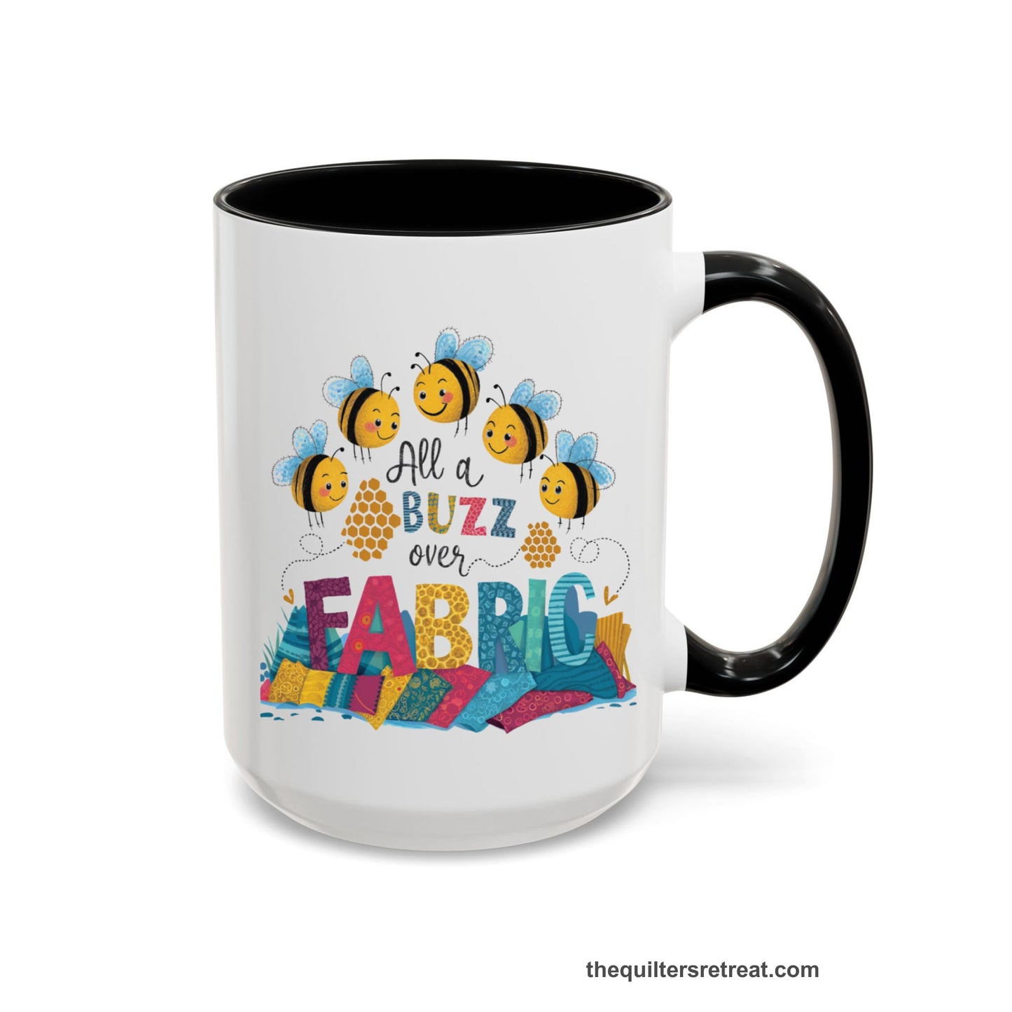 A Black Self-Fulfilled Accent Mug with a playful bees with "All a Buzz over Fabric" text and colorful fabric stacks
