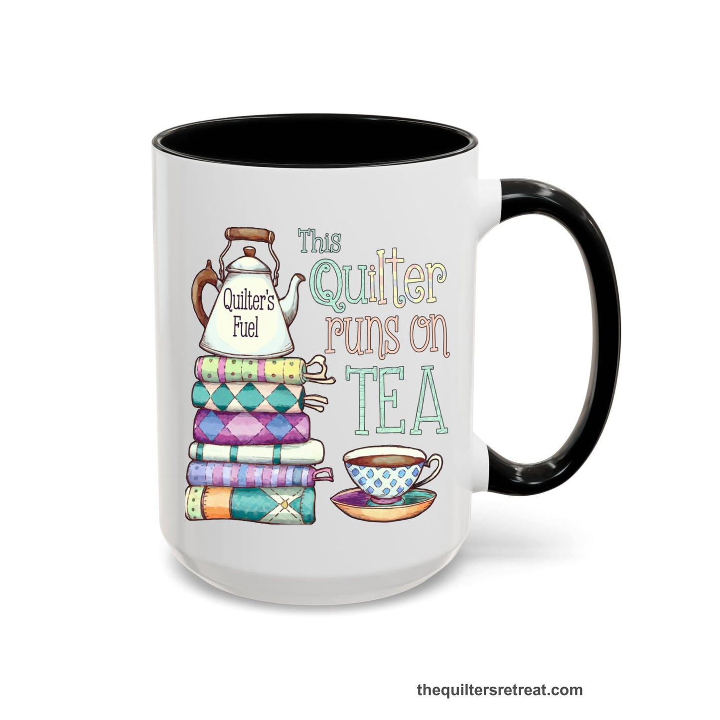 A Black Self-Fulfilled Ceramic Accent Mug with a stack of colorful quilts with teapot and cup, whimsical "This Quilter Runs on Tea" text