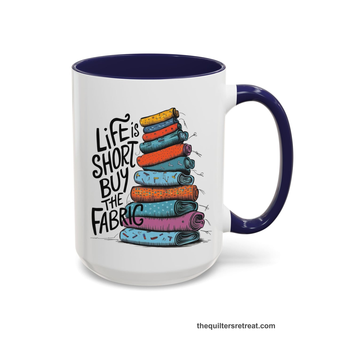 A Navy Self-Fulfilled Accent Mug with a illustration of colorful fabric rolls with bold "Life is Short Buy the Fabric" text