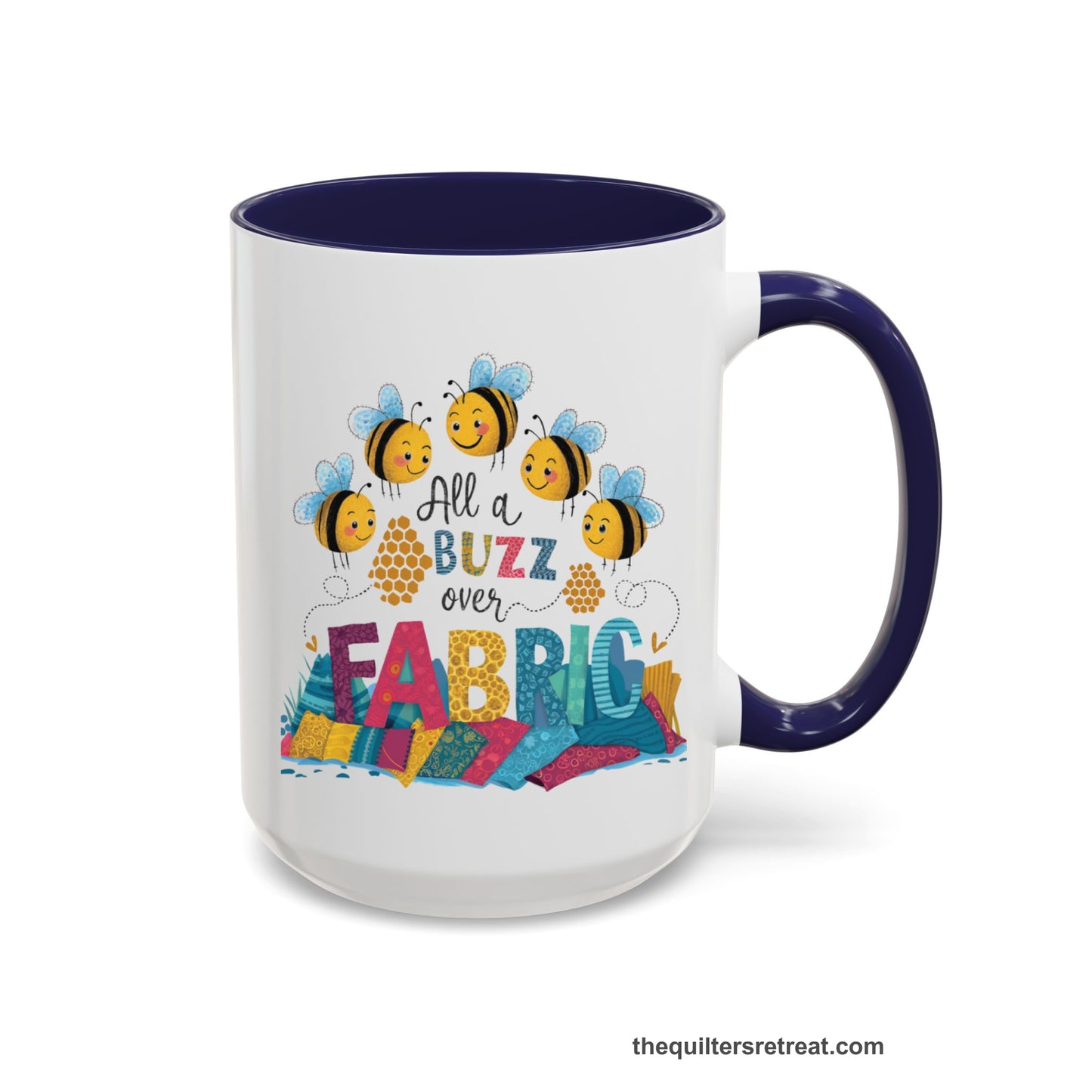 A Navy Self-Fulfilled Accent Mug with a playful bees with "All a Buzz over Fabric" text and colorful fabric stacks
