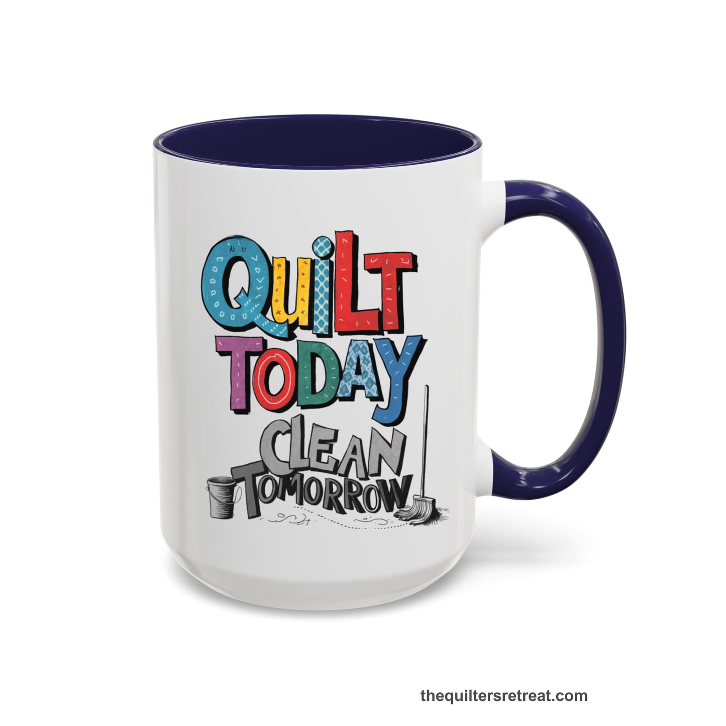 A Navy Self-Fulfilled Accent Mug with a playful "Quilt Today Clean Tomorrow" text with colorful patterns and cleaning tools illustration
