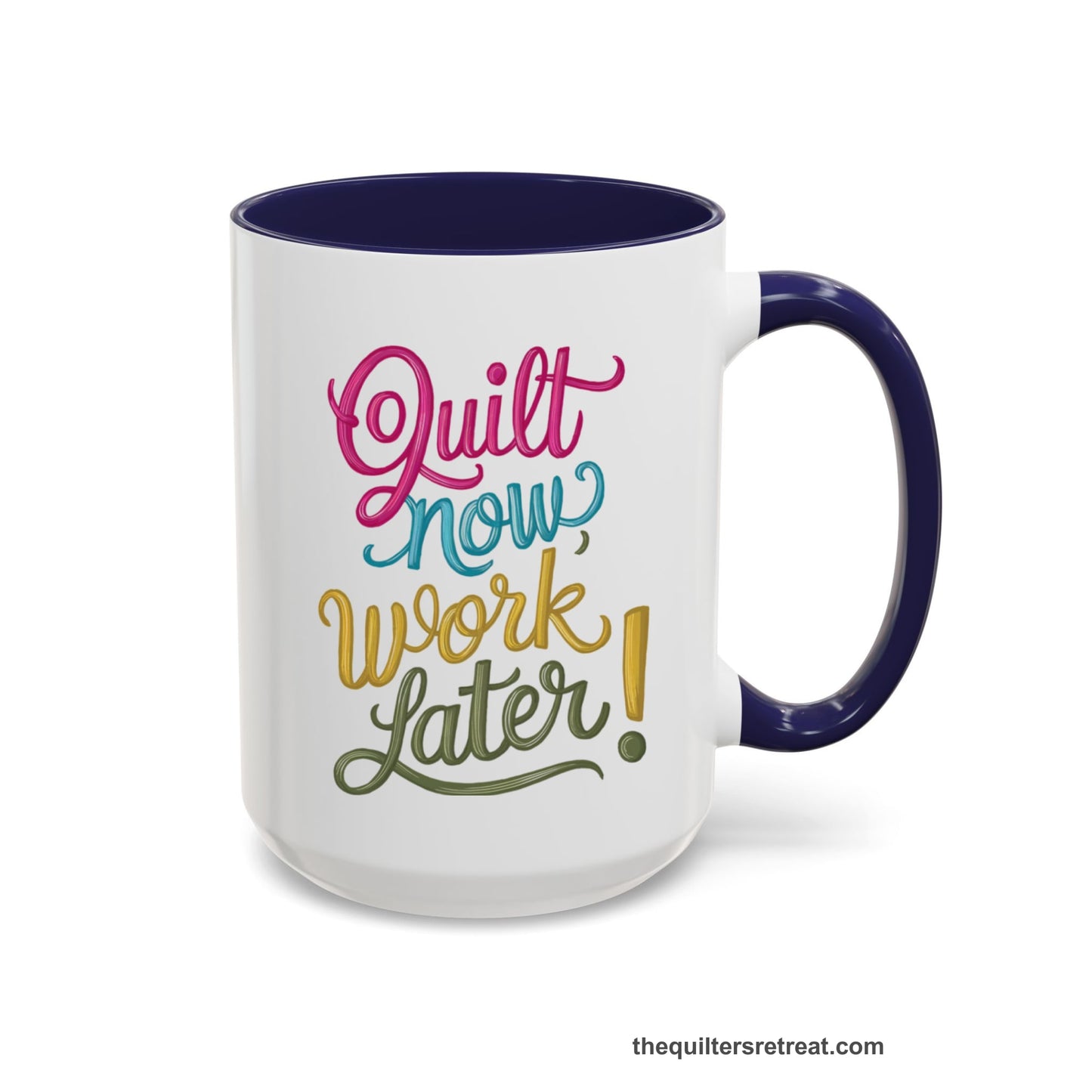 A Navy Coffee Mug with a vibrant "Quilt Now, Work Later" text in playful, cursive lettering