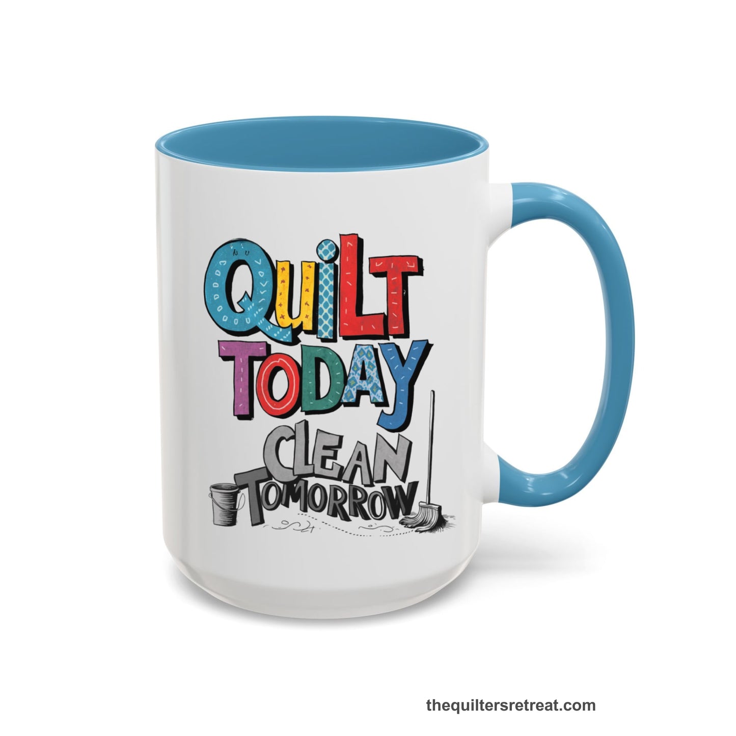 A Light Blue Self-Fulfilled Accent Mug with a playful "Quilt Today Clean Tomorrow" text with colorful patterns and cleaning tools illustration