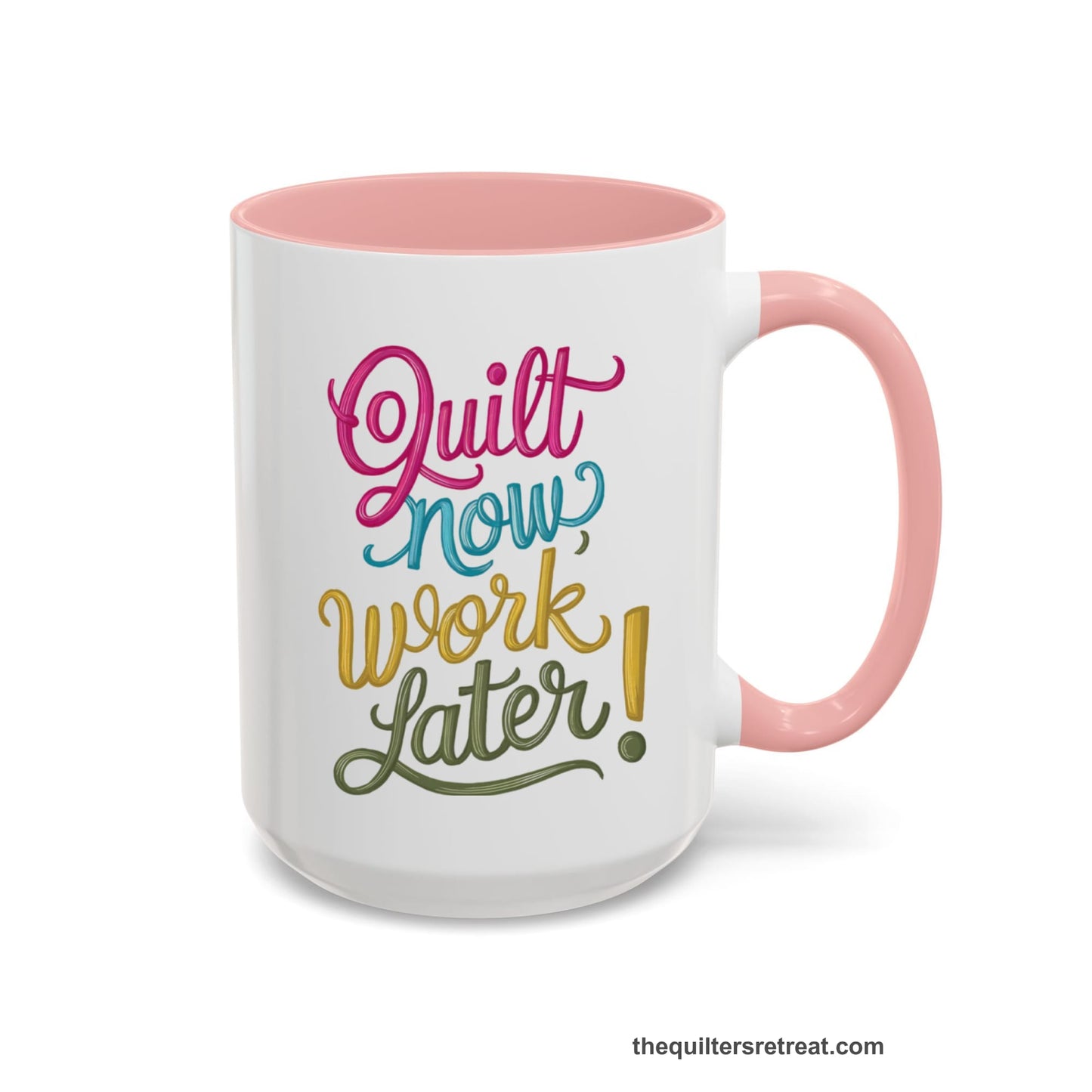 A Pink Coffee Mug with a vibrant "Quilt Now, Work Later" text in playful, cursive lettering