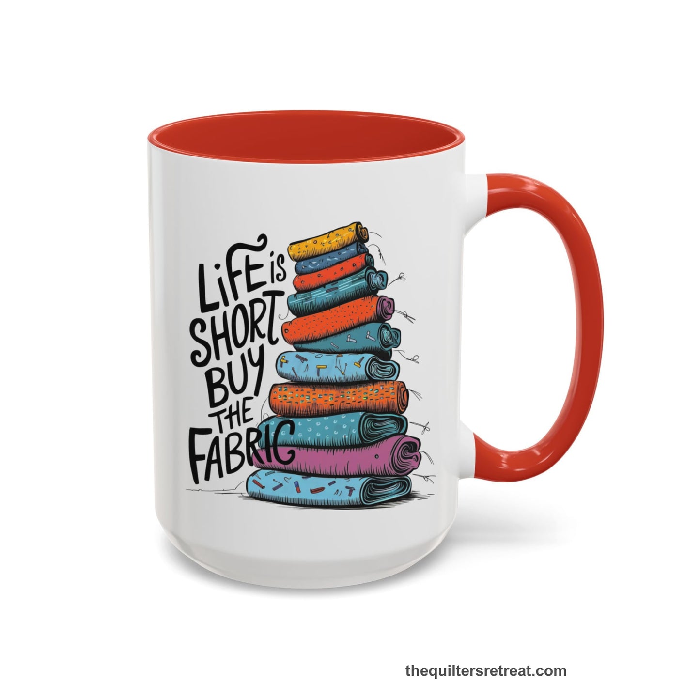 A Self-Fulfilled Accent Mug with a illustration of colorful fabric rolls with bold "Life is Short Buy the Fabric" text