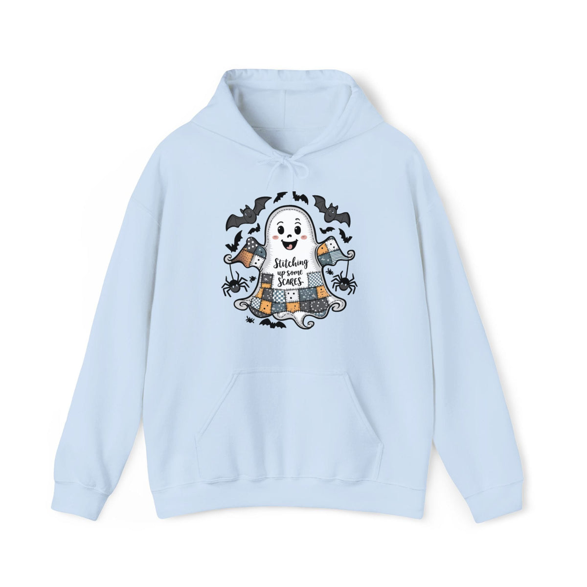 Quilter Gift: A Light Blue Halloween Hoodie with cute patchwork ghost with "Stitching up some Scares" text and playful bats in a whimsical style