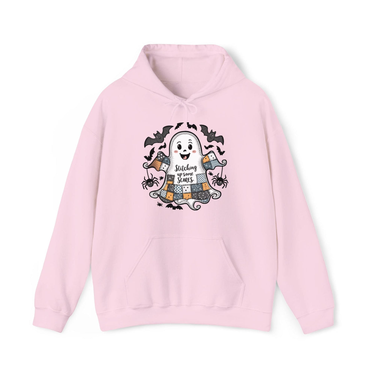 Quilter Gift: A Light Pink Halloween Hoodie with cute patchwork ghost with "Stitching up some Scares" text and playful bats in a whimsical style