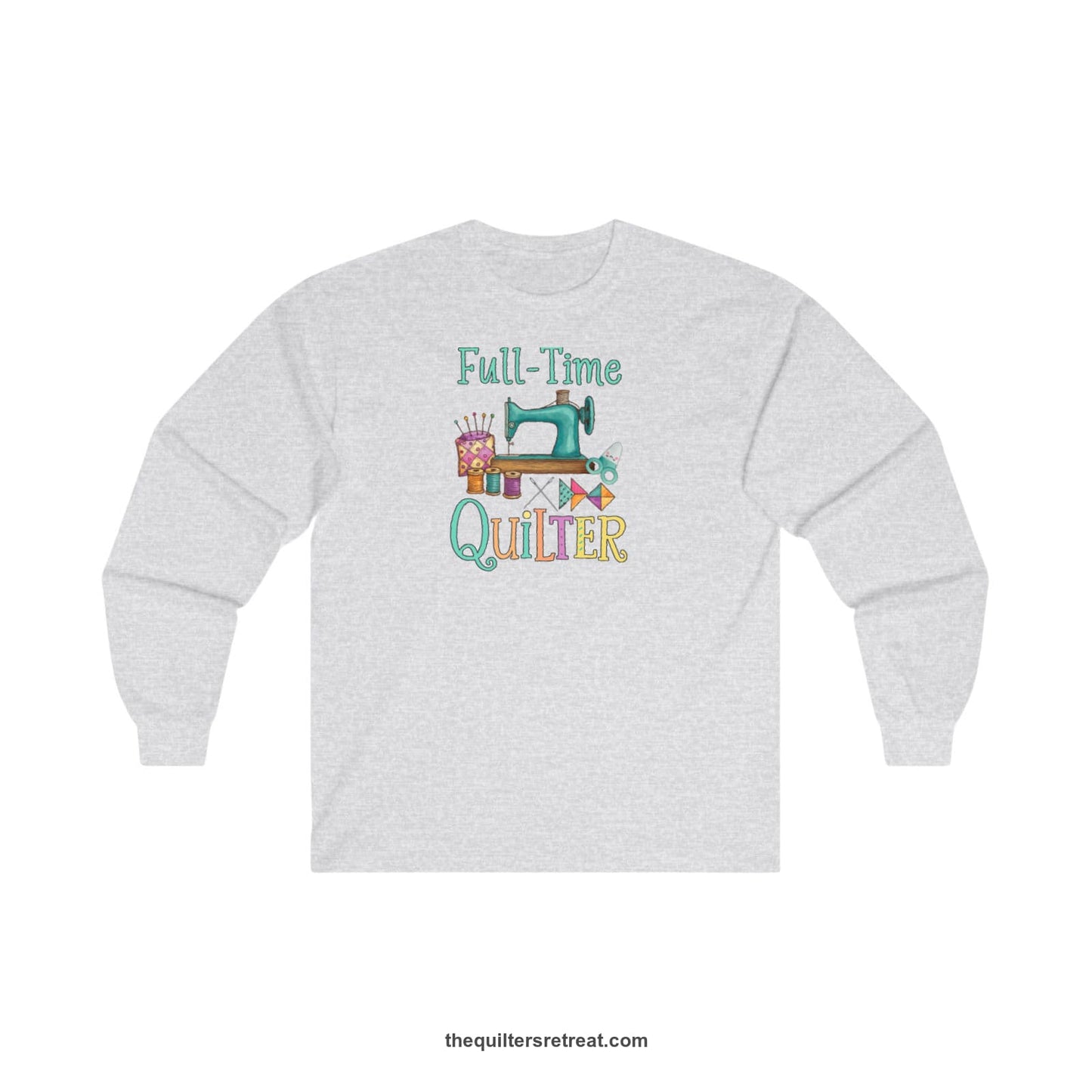 A Ash Long Sleeve T-Shirt with a vintage sewing machine with colorful threads and "Full-Time Quilter" text in playful style