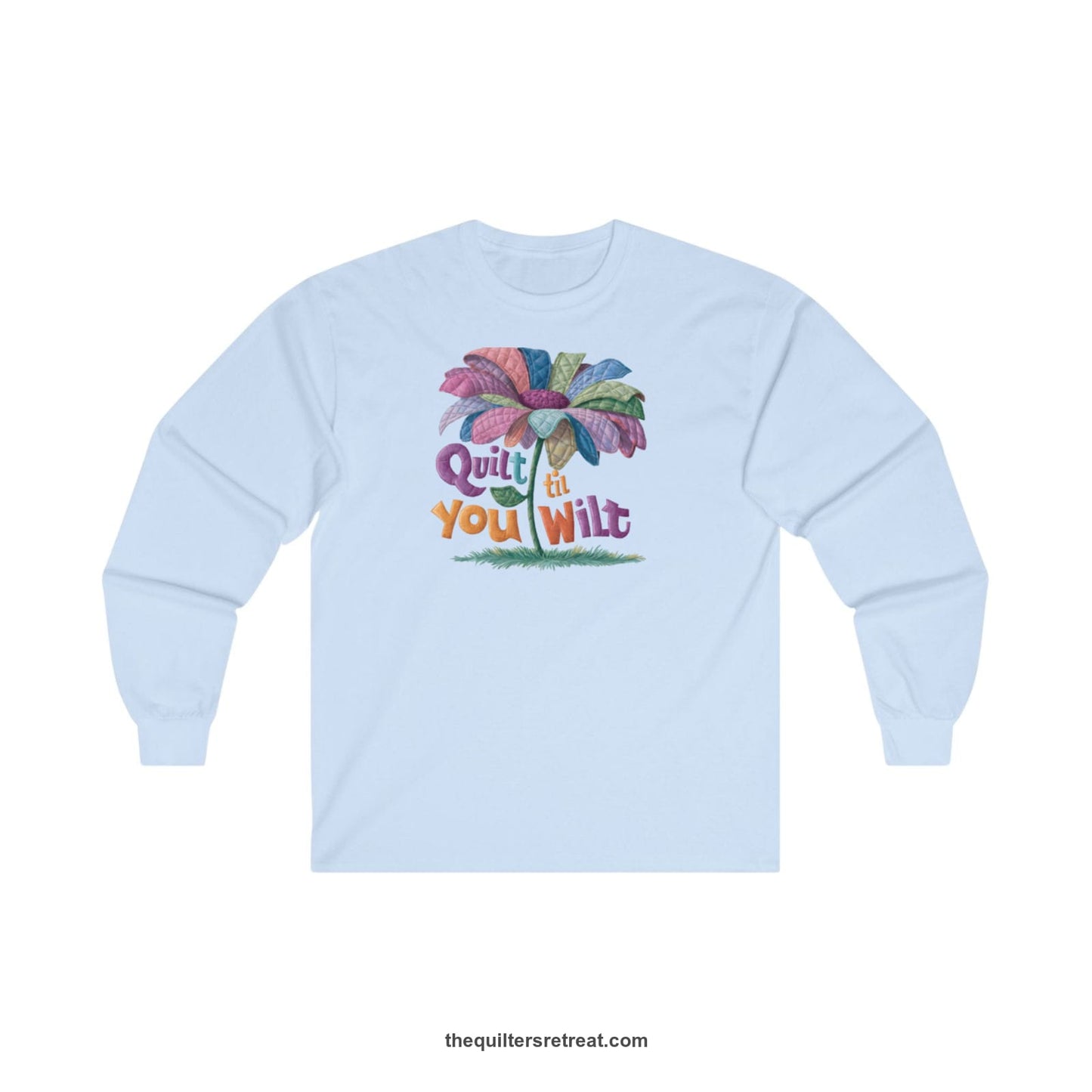 A Long Sleeve T-Shirt with a whimsical quilted flower with bold "Quilt til You Wilt" text