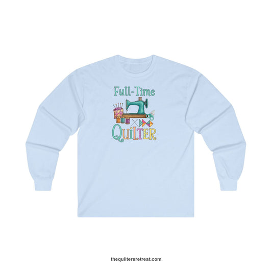 A Long Sleeve T-Shirt with a vintage sewing machine with colorful threads and "Full-Time Quilter" text in playful style