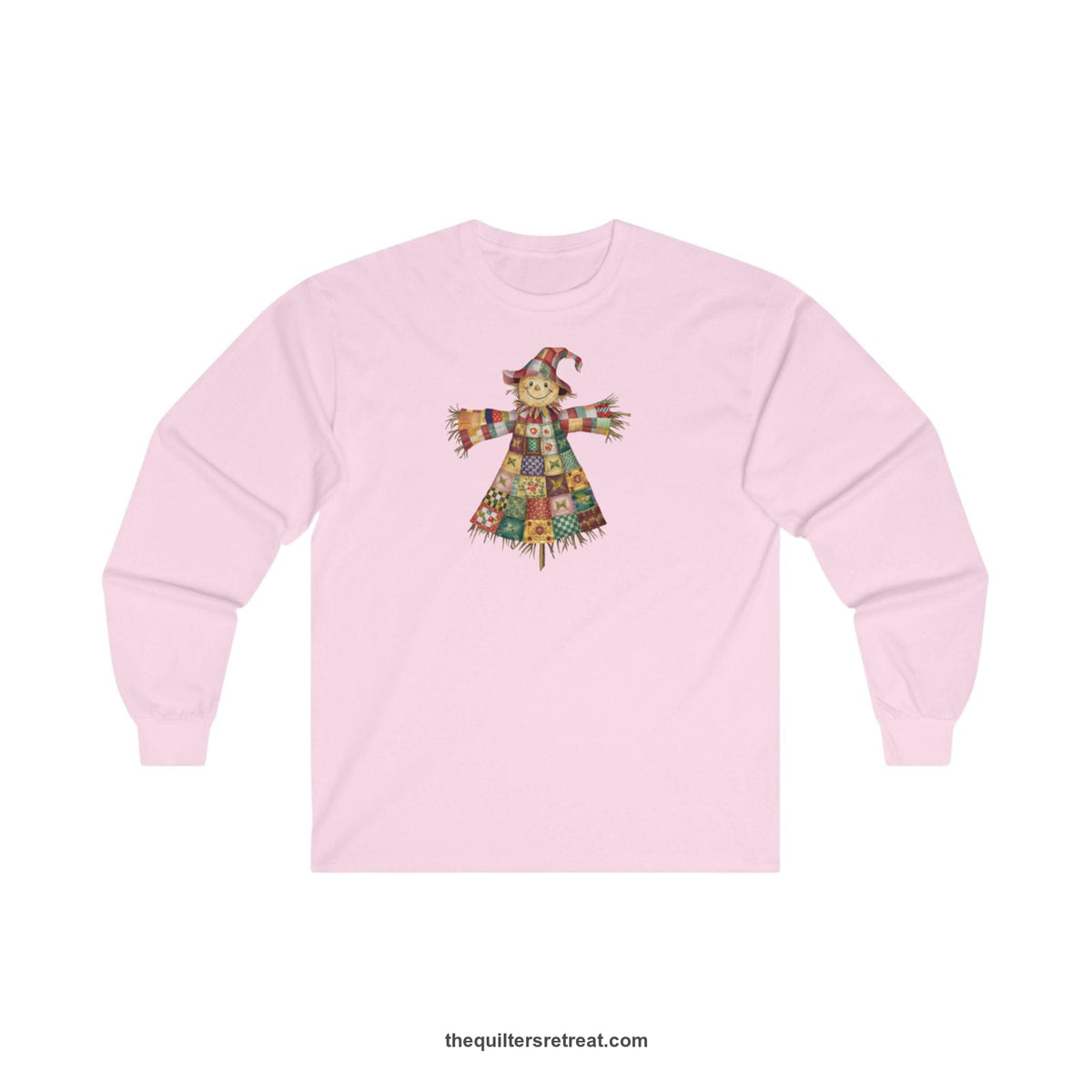 Quilter Gift: A Light Pink Long Sleeve T-Shirt with patchwork scarecrow with a cheerful face in a whimsical style