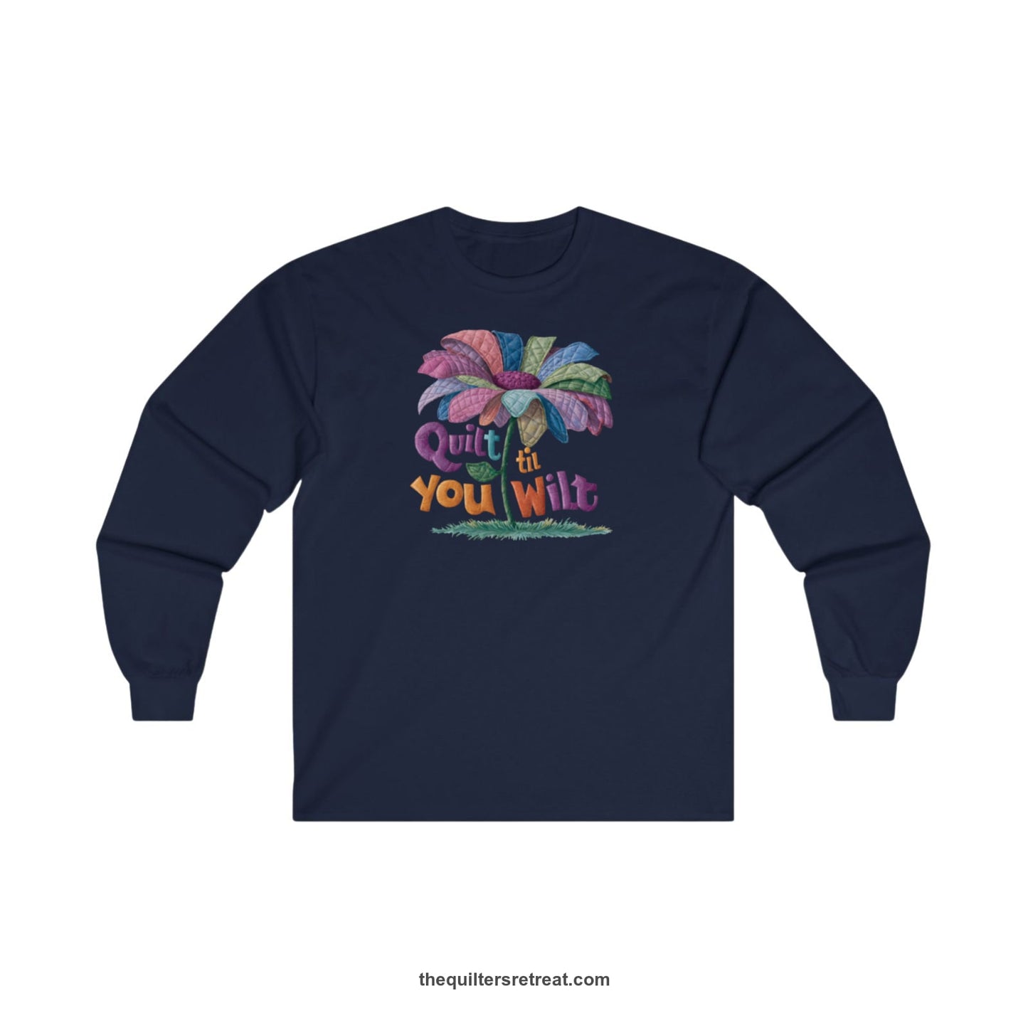 A Navy Long Sleeve T-Shirt with a whimsical quilted flower with bold "Quilt til You Wilt" text