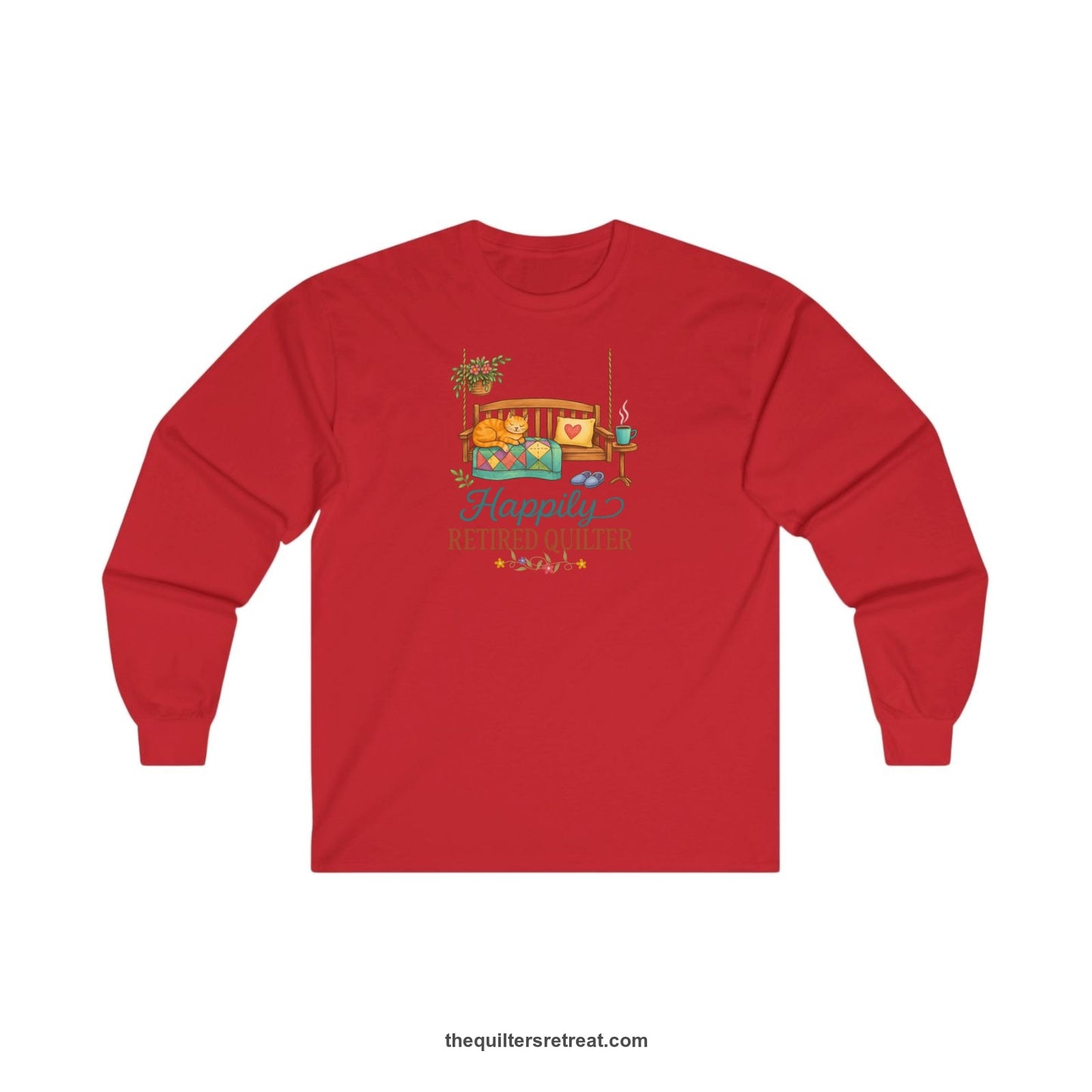 A Red Long Sleeve T-Shirt with a hanging bench with cozy cat and quilt, surrounded by plants, "Happily Retired Quilter" text