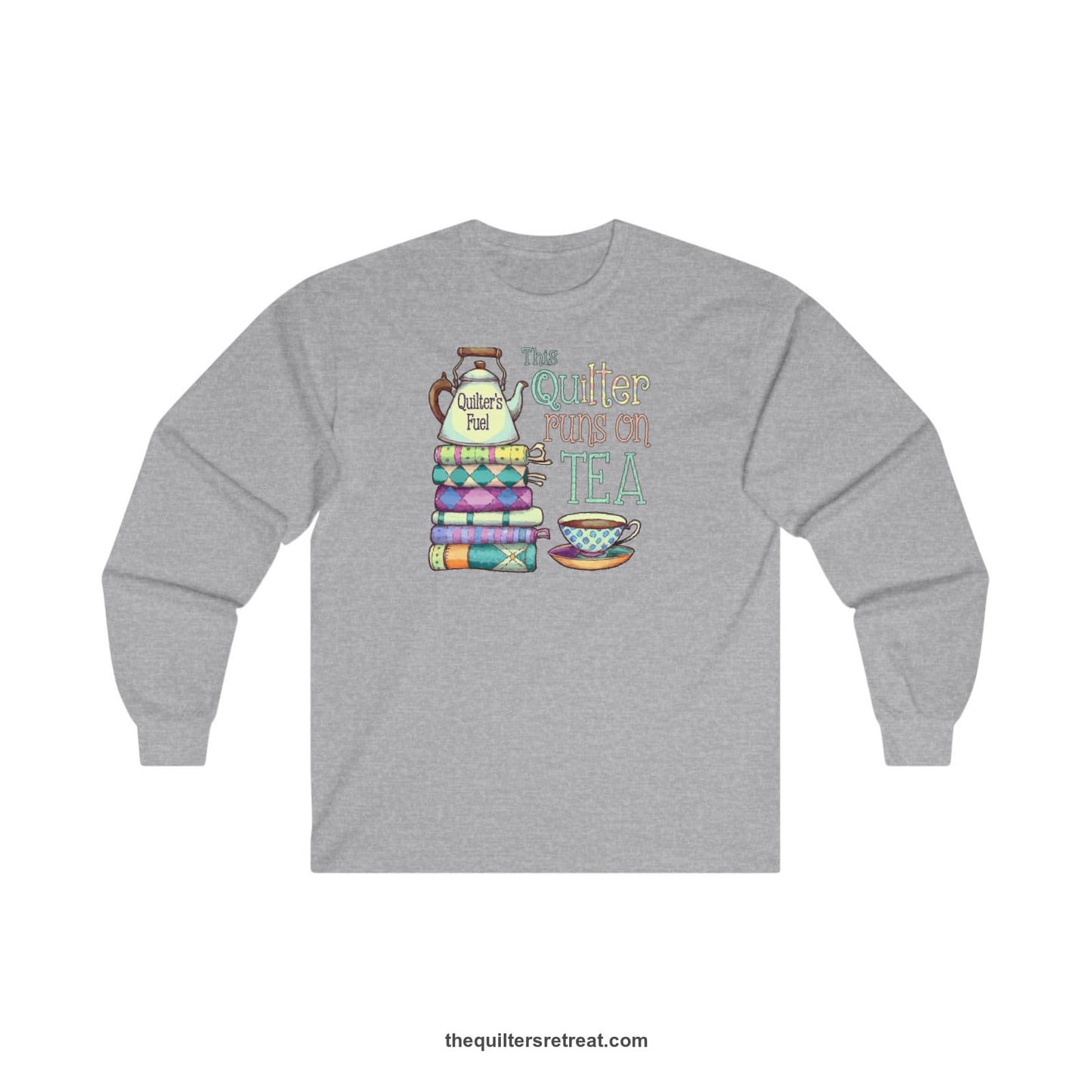 A Sport Grey Long Sleeve T-Shirt with a stack of colorful quilts with teapot and cup, whimsical "This Quilter Runs on Tea" text