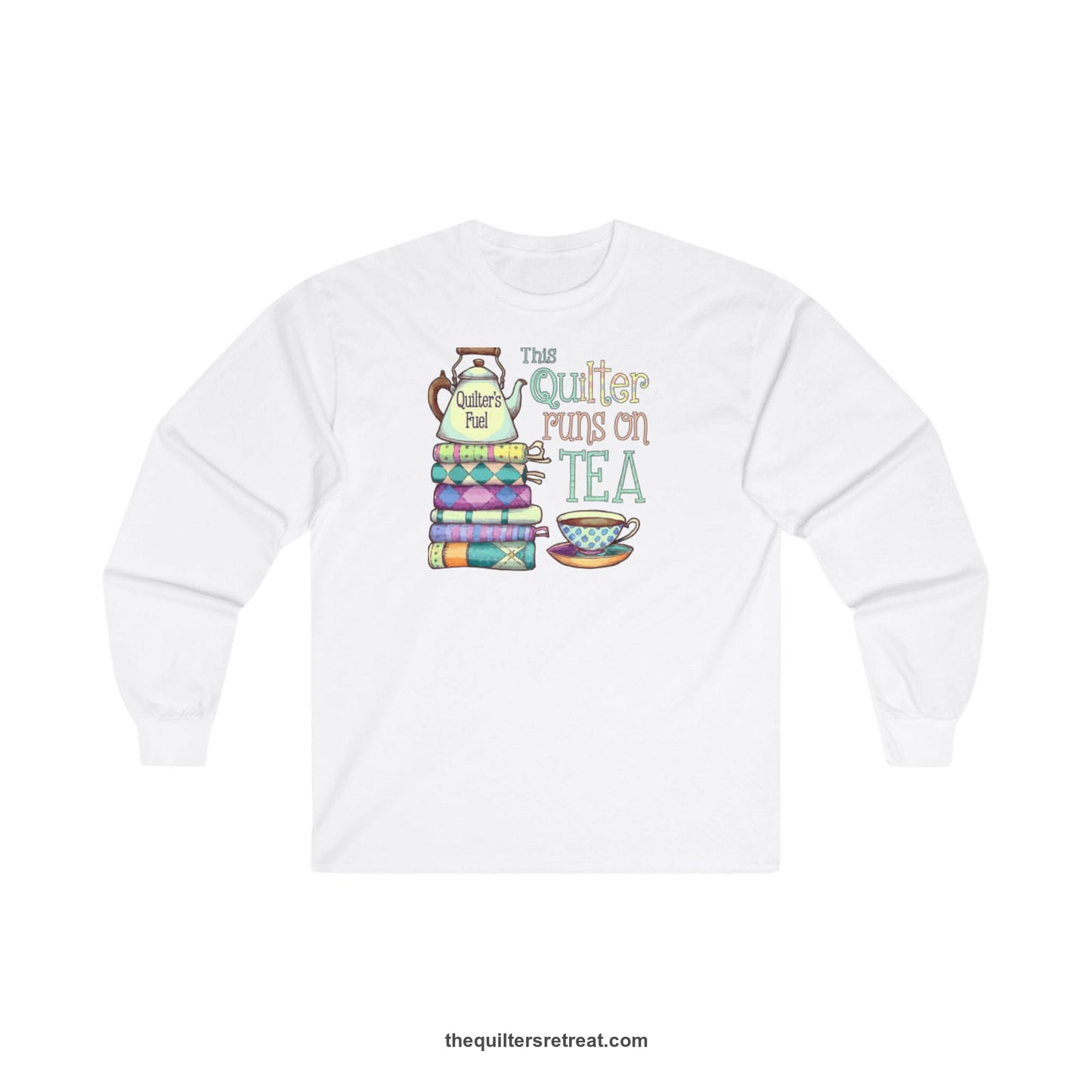 A White Long Sleeve T-Shirt with a stack of colorful quilts with teapot and cup, whimsical "This Quilter Runs on Tea" text