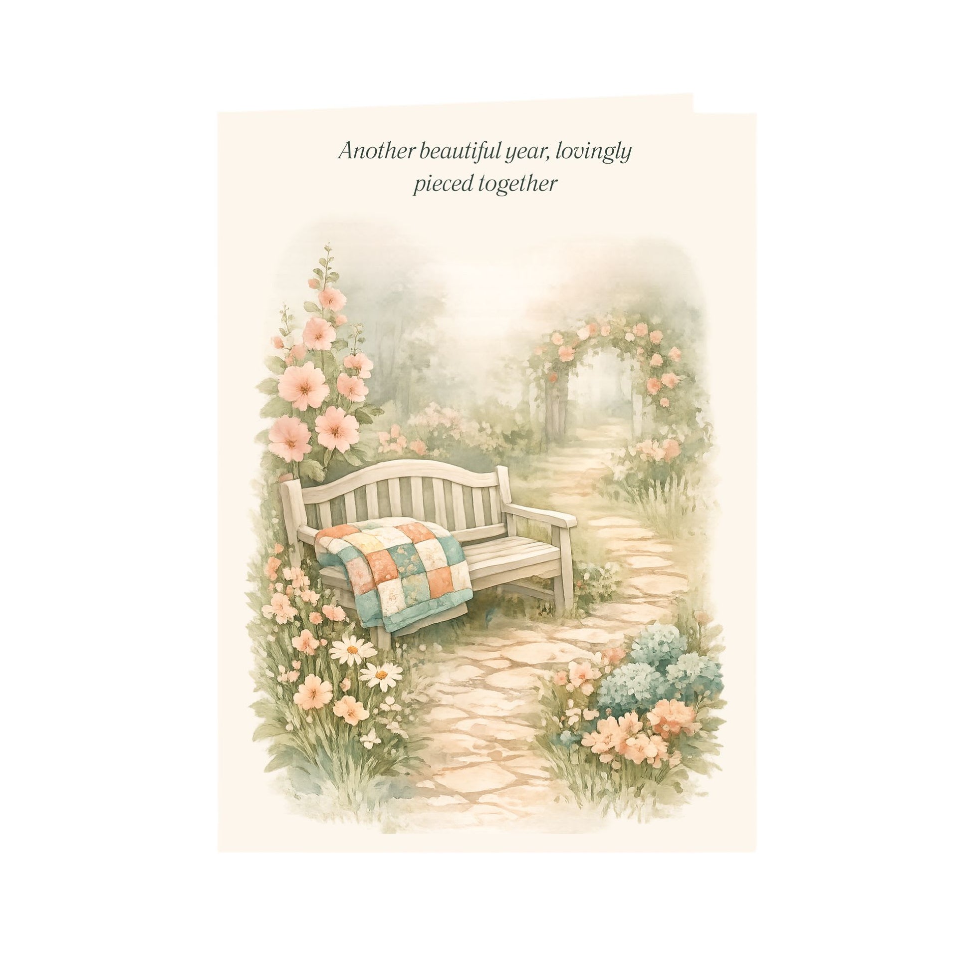 Soft birthday card for quilters featuring a garden bench, quilt, and cottage flowers.