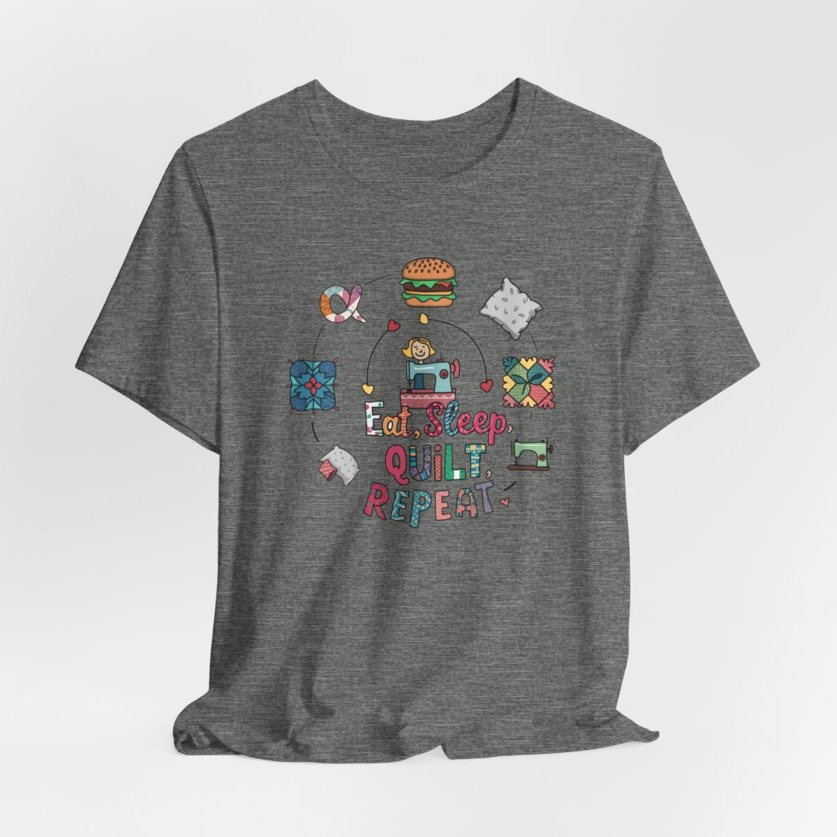 A Deep Heather funny quilting T-Shirt with the phrase Eat, Sleep, Quilt, Repeat  showing the cycle of a quilter's day with eating, sleeping, and quilting