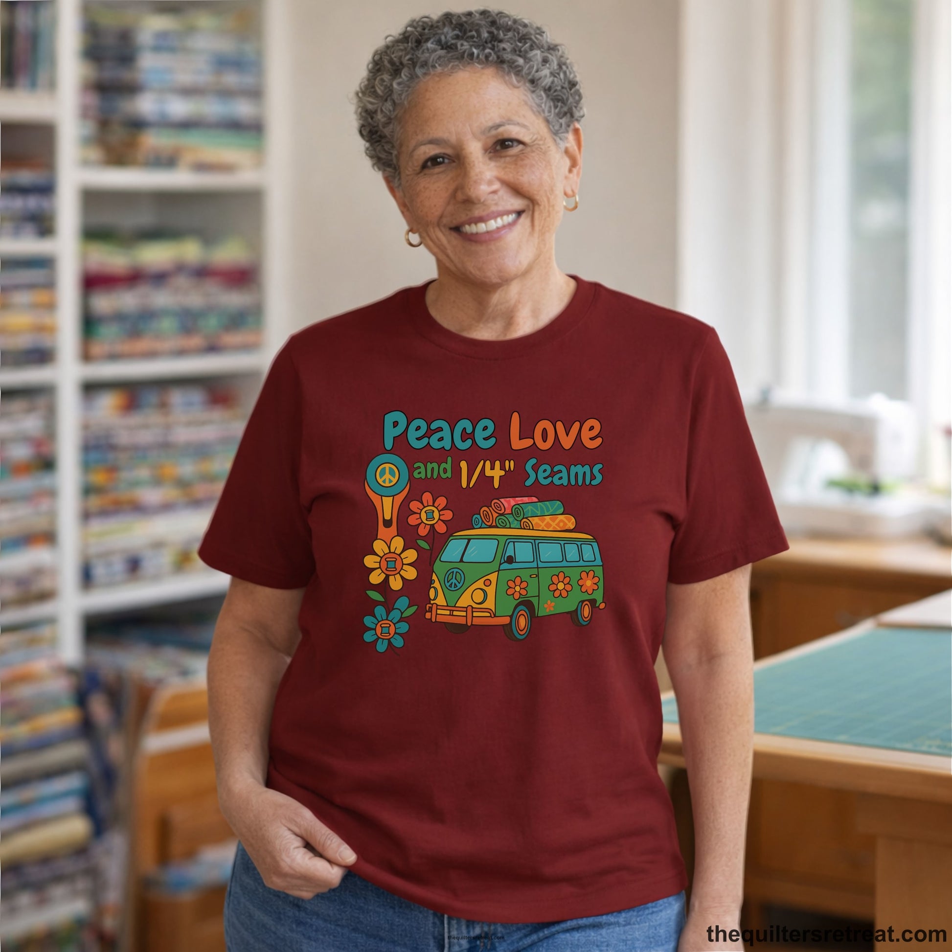 A Cardinal Short Sleeve T-Shirt with a peace sign van with colorful flowers and "Peace Love and 1/4 Seams" text in retro style