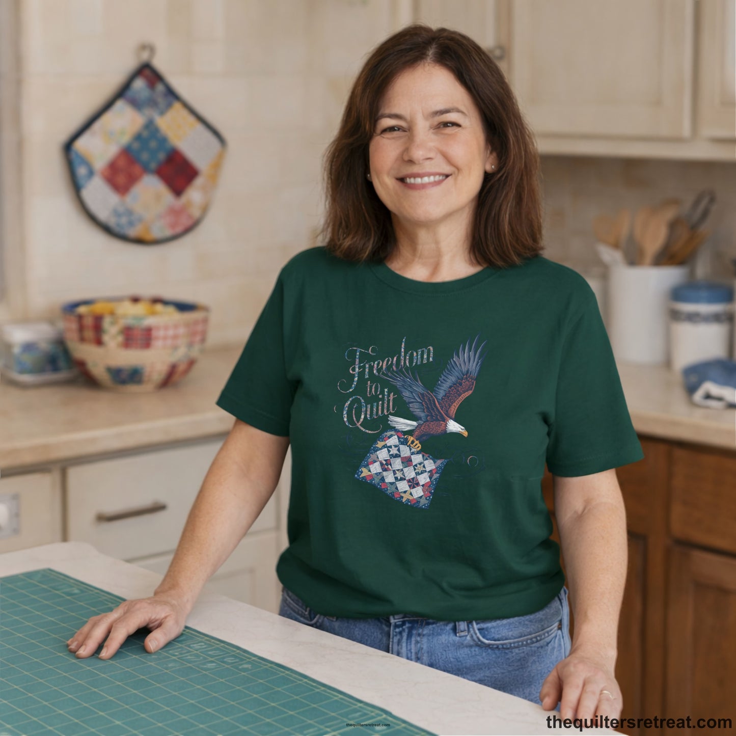 A Short Sleeve T-Shirt with a freedom to quilt text with an eagle carrying a colorful patchwork quilt in vintage style