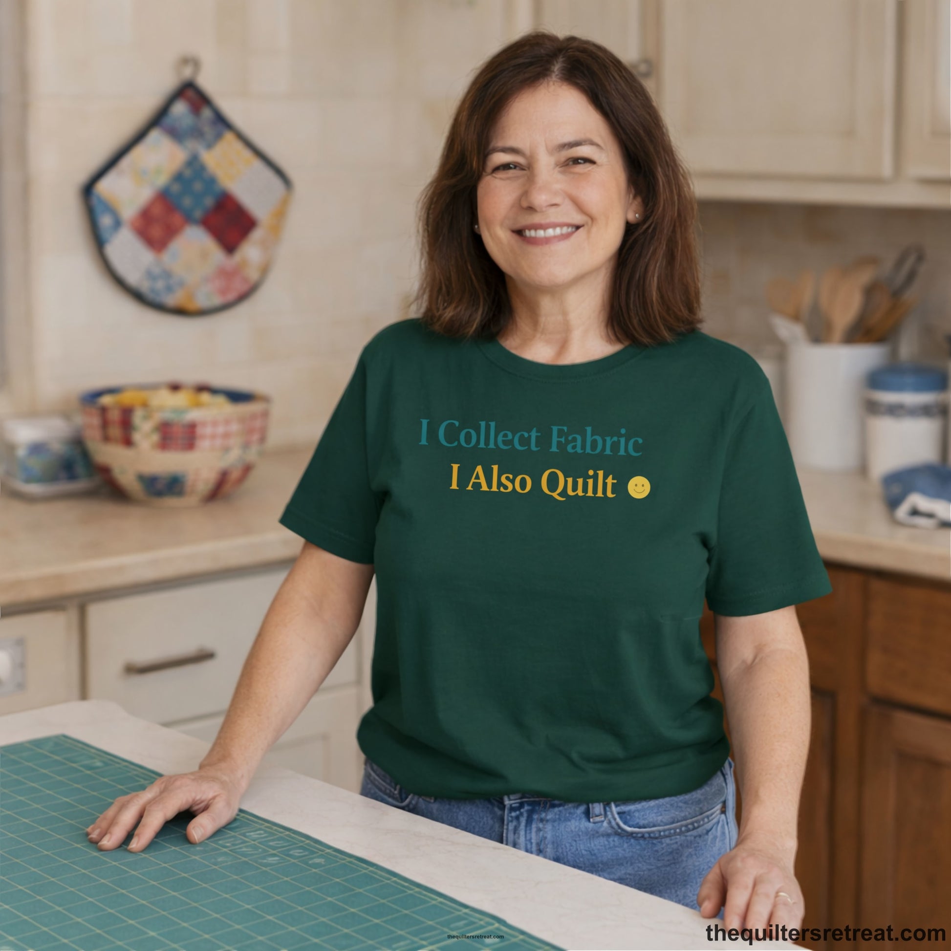 A Short Sleeve T-Shirt with a Colorful text saying "I Collect Fabric I Also Quilt" with a playful, cheerful vibe.