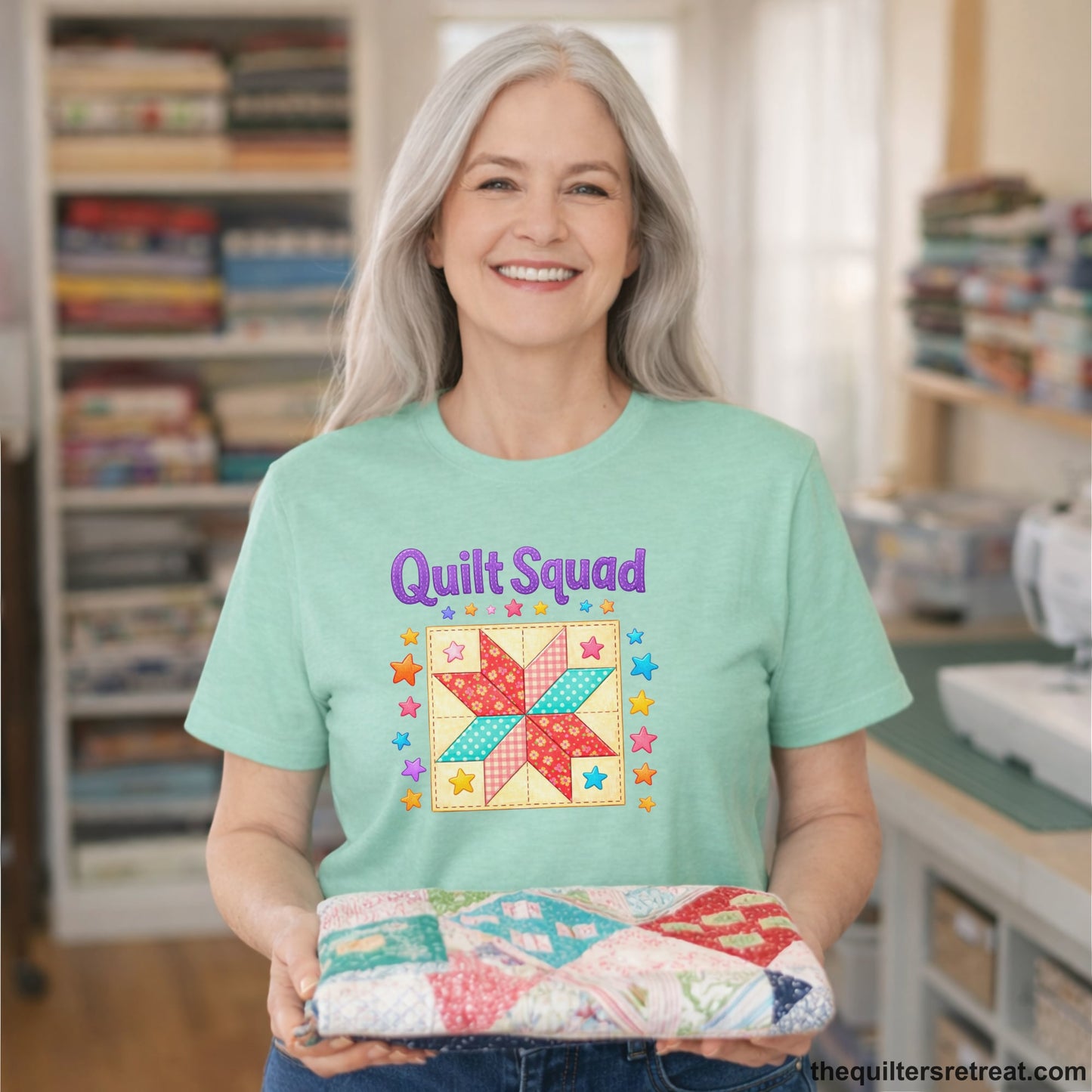 A Heather Mint Short Sleeve T-Shirt with a Patchwork quilt star with colorful stars, playful mood, "Quilt Squad" text.