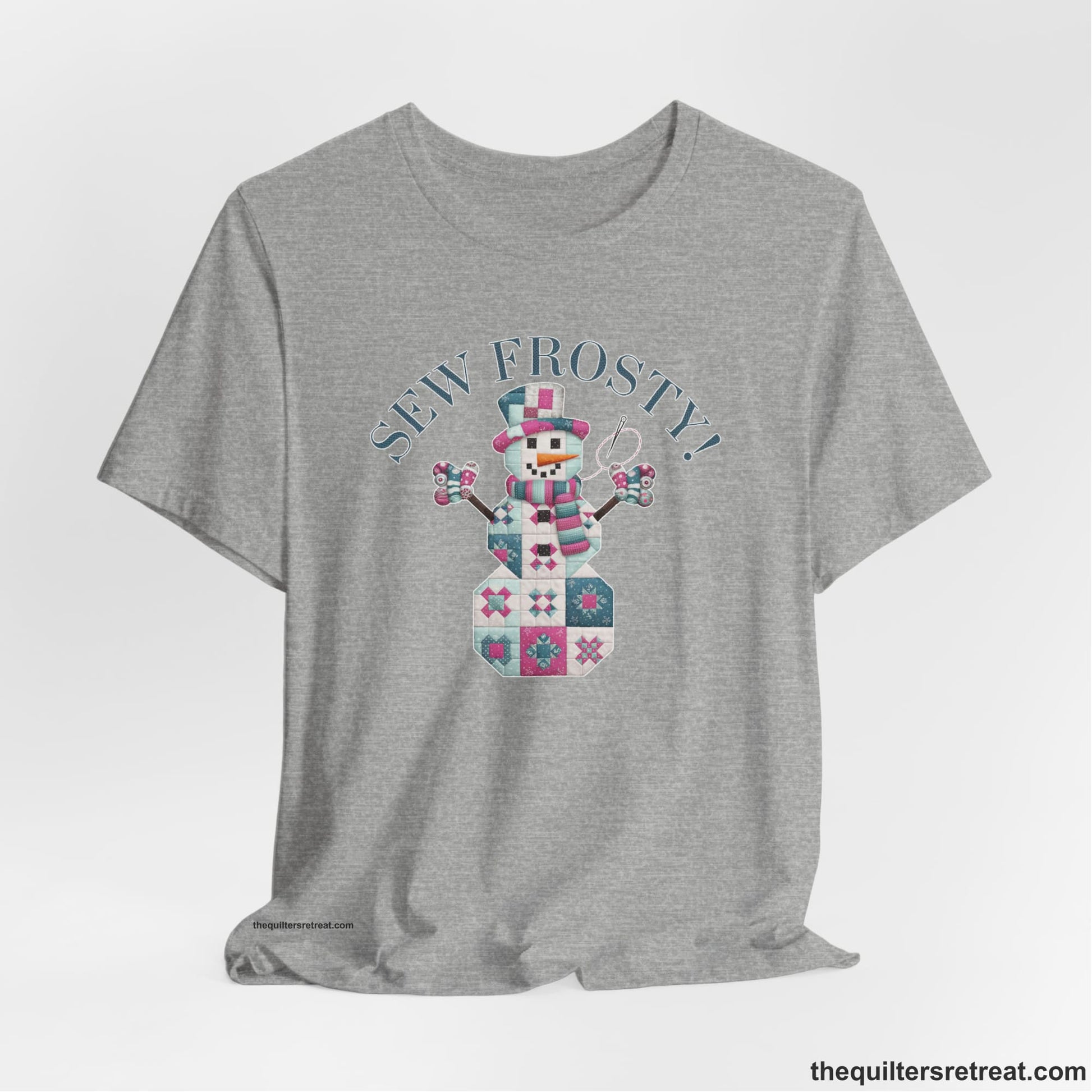 A Athletic Heather Short Sleeve T-Shirt with a snowman quilt pattern with "Sew Frosty!" text in a crafty style