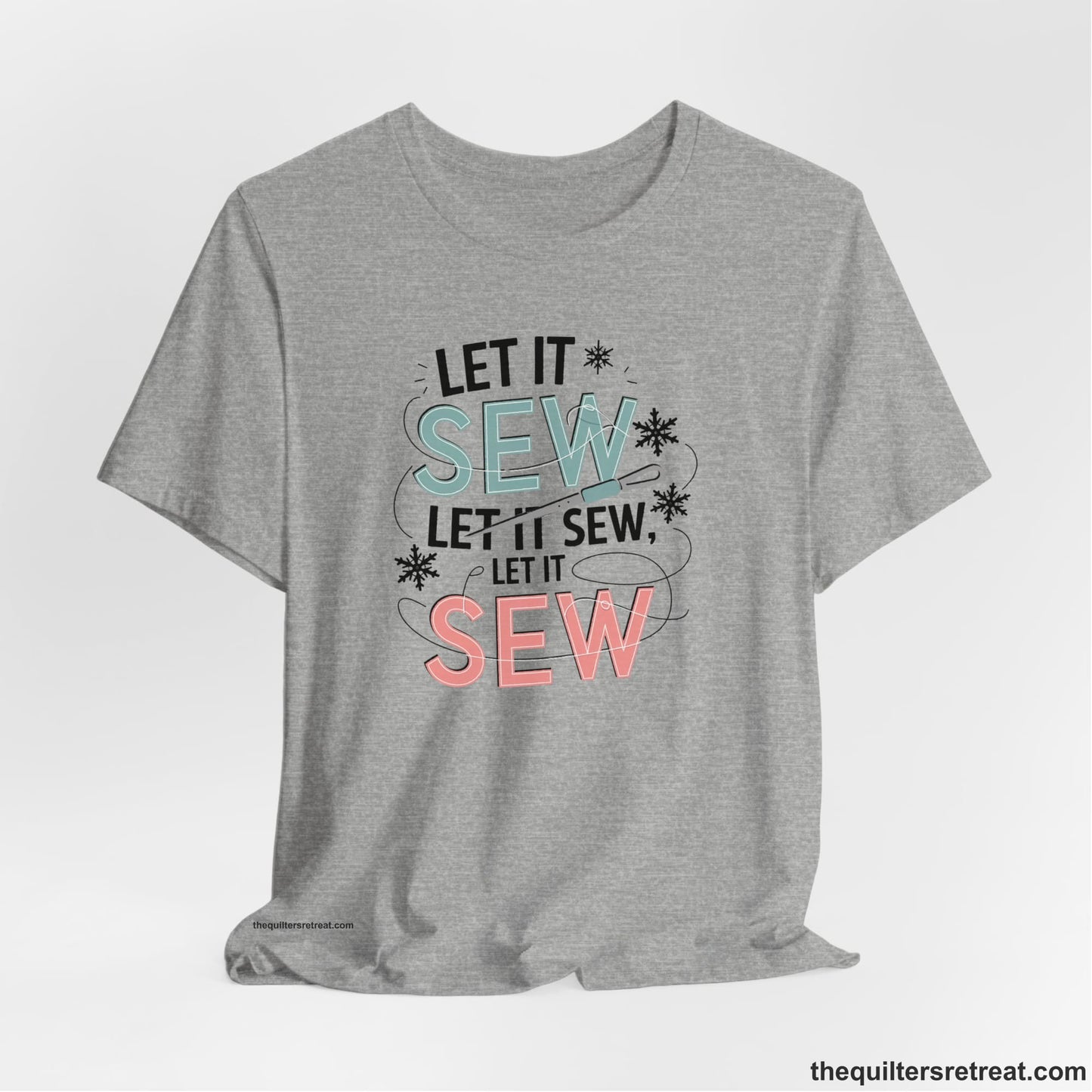 A Athletic Heather Short Sleeve T-Shirt with a bold "SEW" text with needle and thread in a modern style