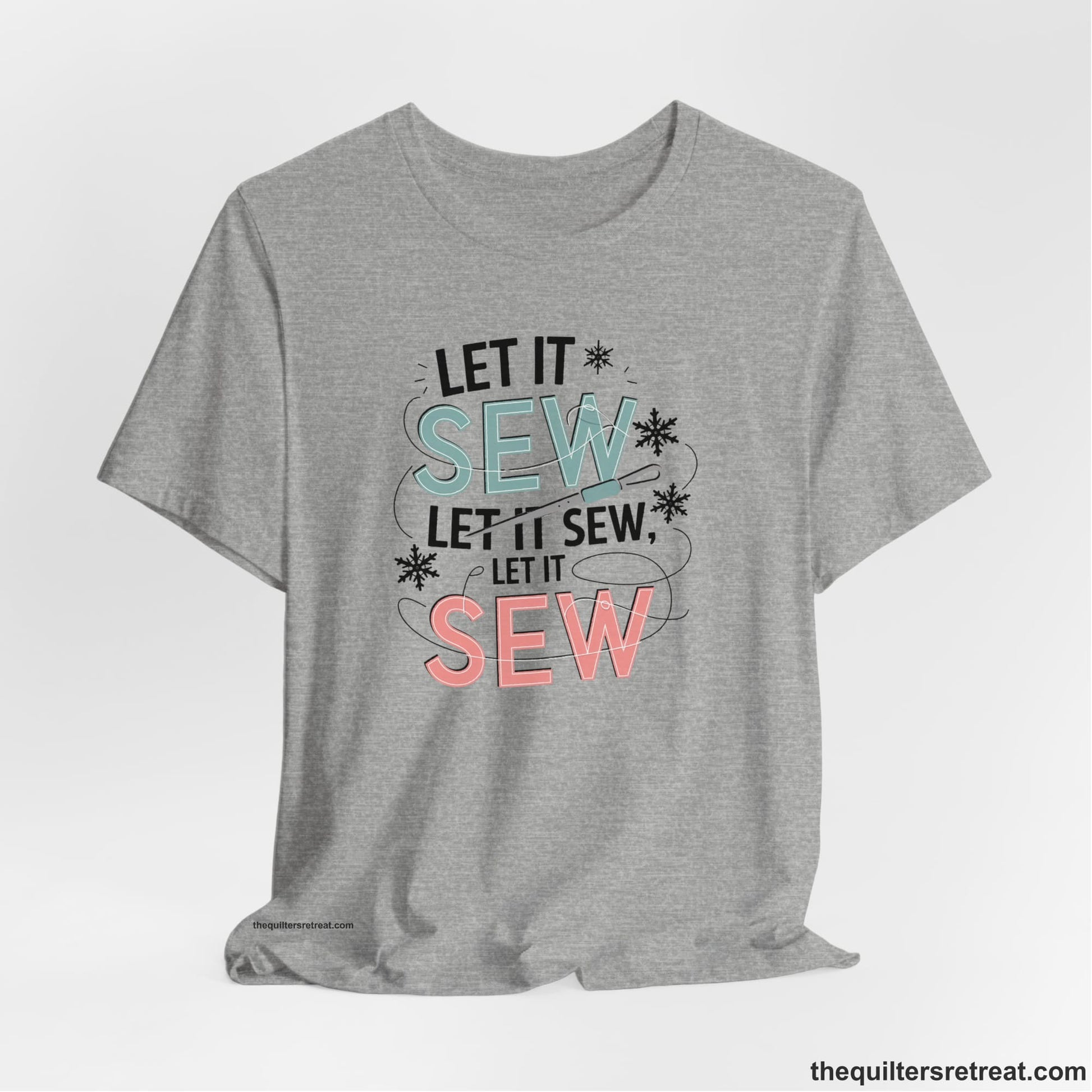A Athletic Heather Short Sleeve T-Shirt with a bold "SEW" text with needle and thread in a modern style