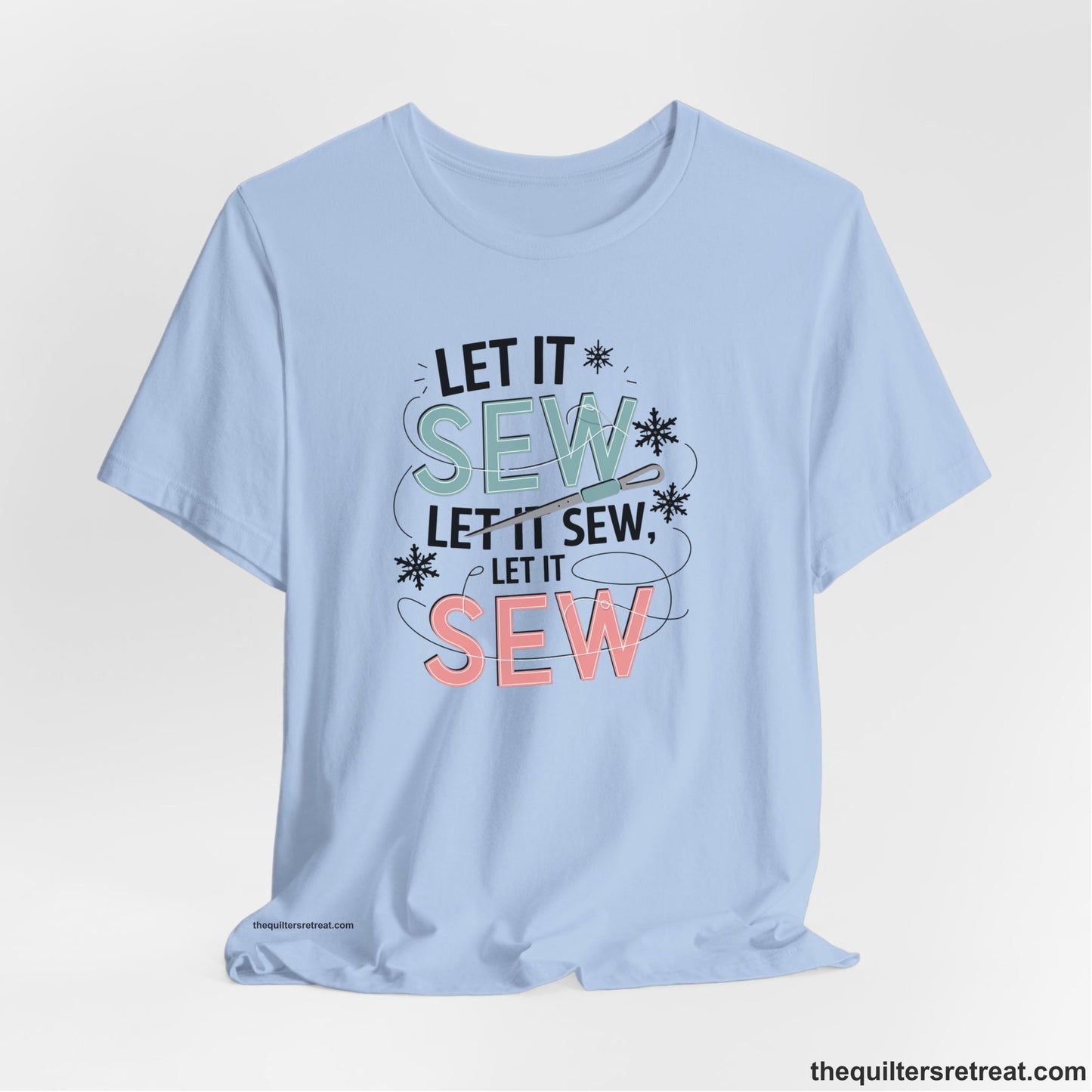 A Baby Blue Short Sleeve T-Shirt with a bold "SEW" text with needle and thread in a modern style