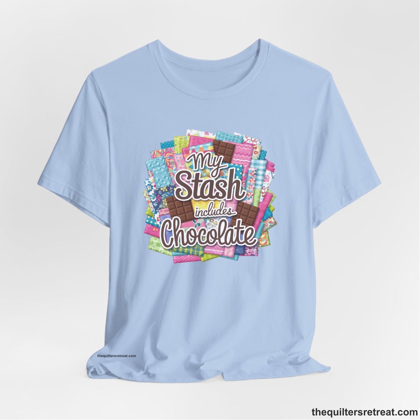 A Baby Blue Short Sleeve T-Shirt with a fabric and chocolate collage with playful "My Stash includes Chocolate" text