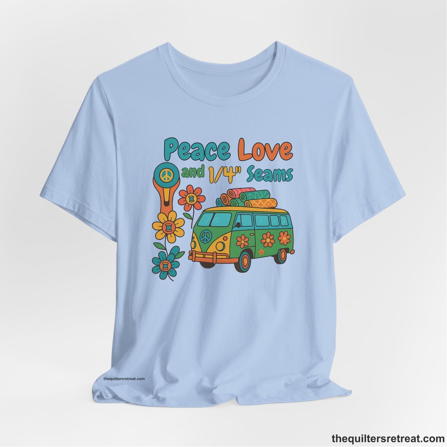 A Baby Blue Short Sleeve T-Shirt with a peace sign van with colorful flowers and "Peace Love and 1/4 Seams" text in retro style