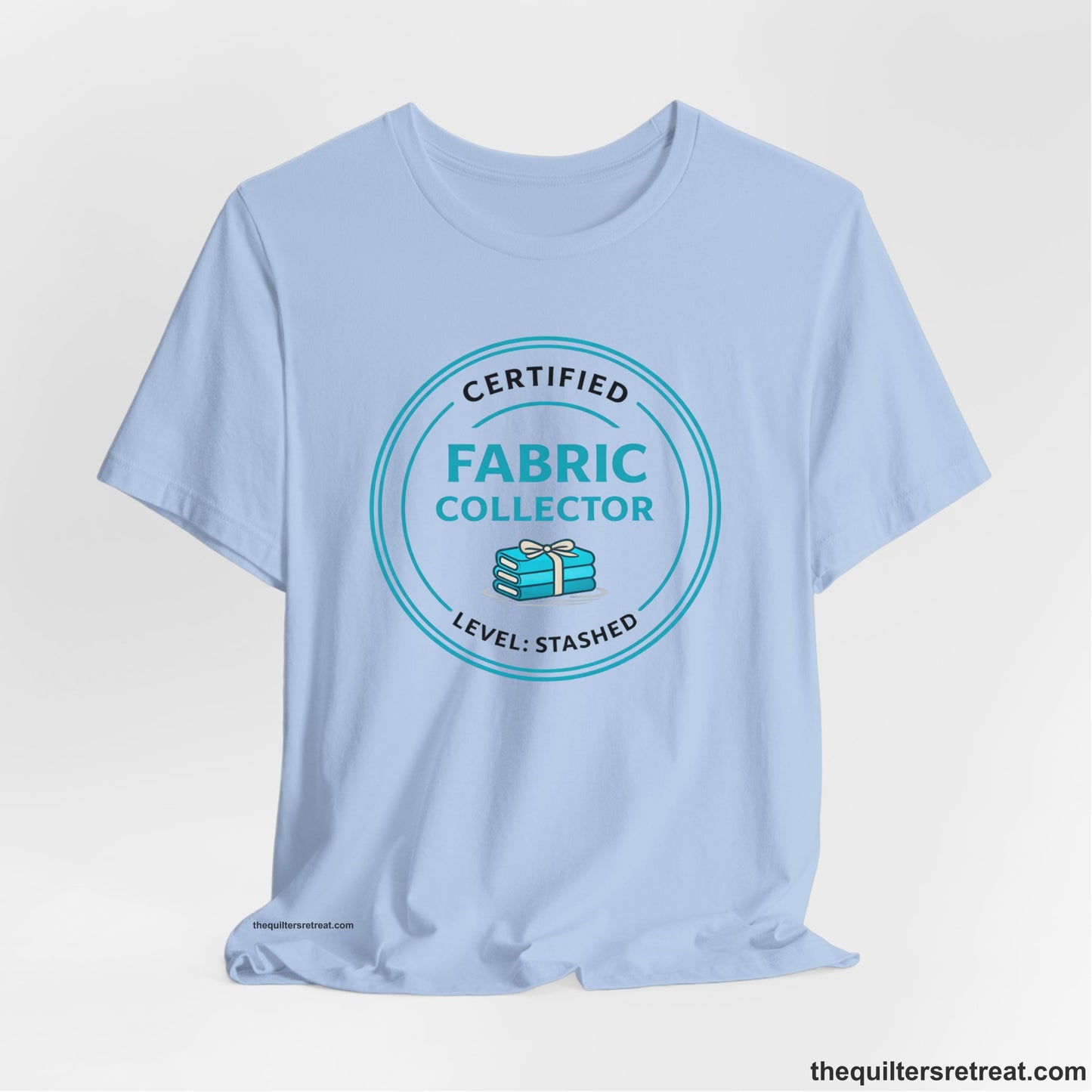 A  Short Sleeve T-Shirt featuring a playful design about fabric collecting.