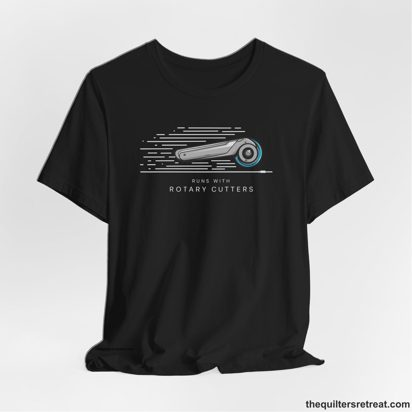 A Black Short Sleeve T-Shirt with a rotary cutter illustration with dynamic lines and bold "Runs with Rotary Cutters" text