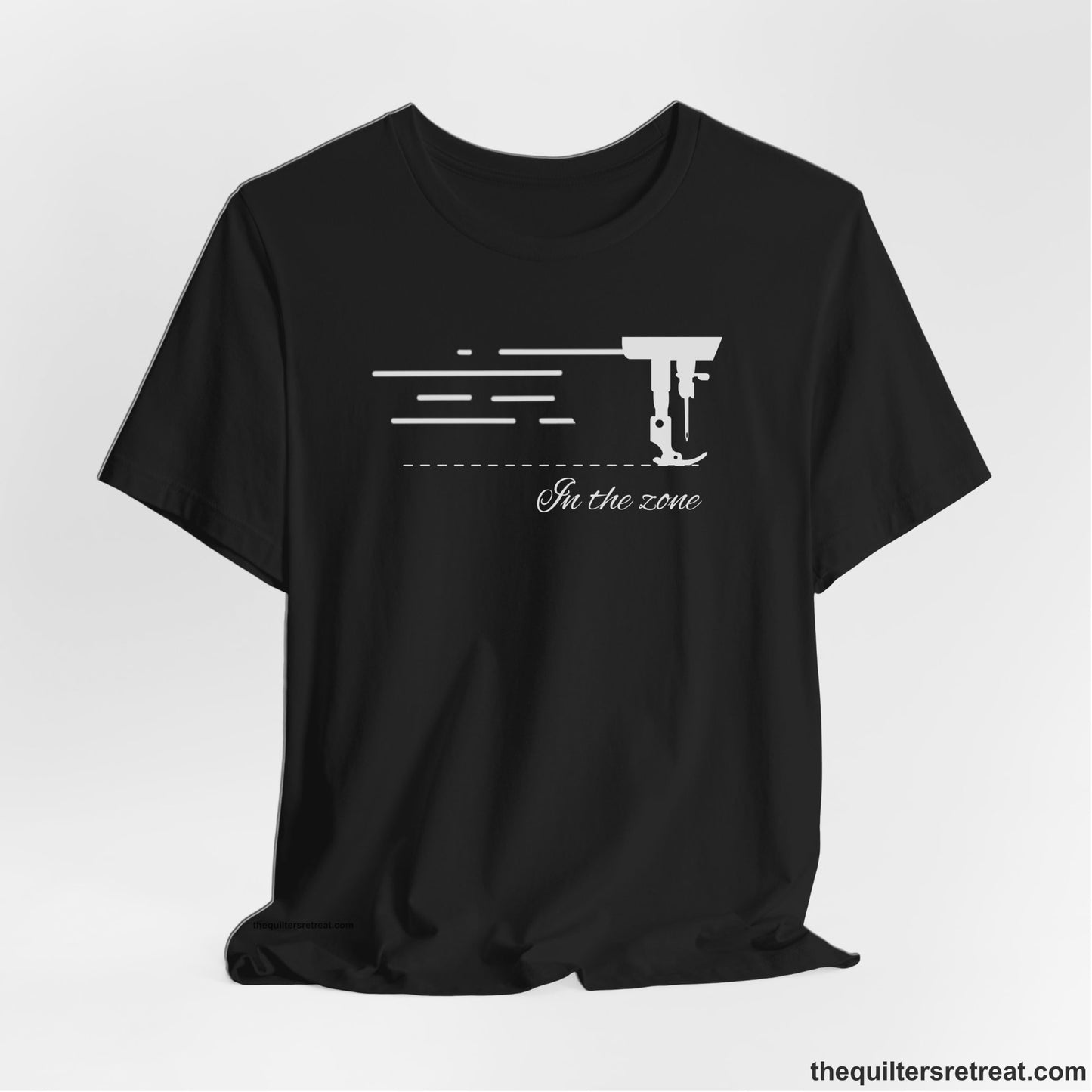 A Black Short Sleeve T-Shirt with a vintage sewing machine illustration with floral accents and "Sewing Mends the Soul" text
