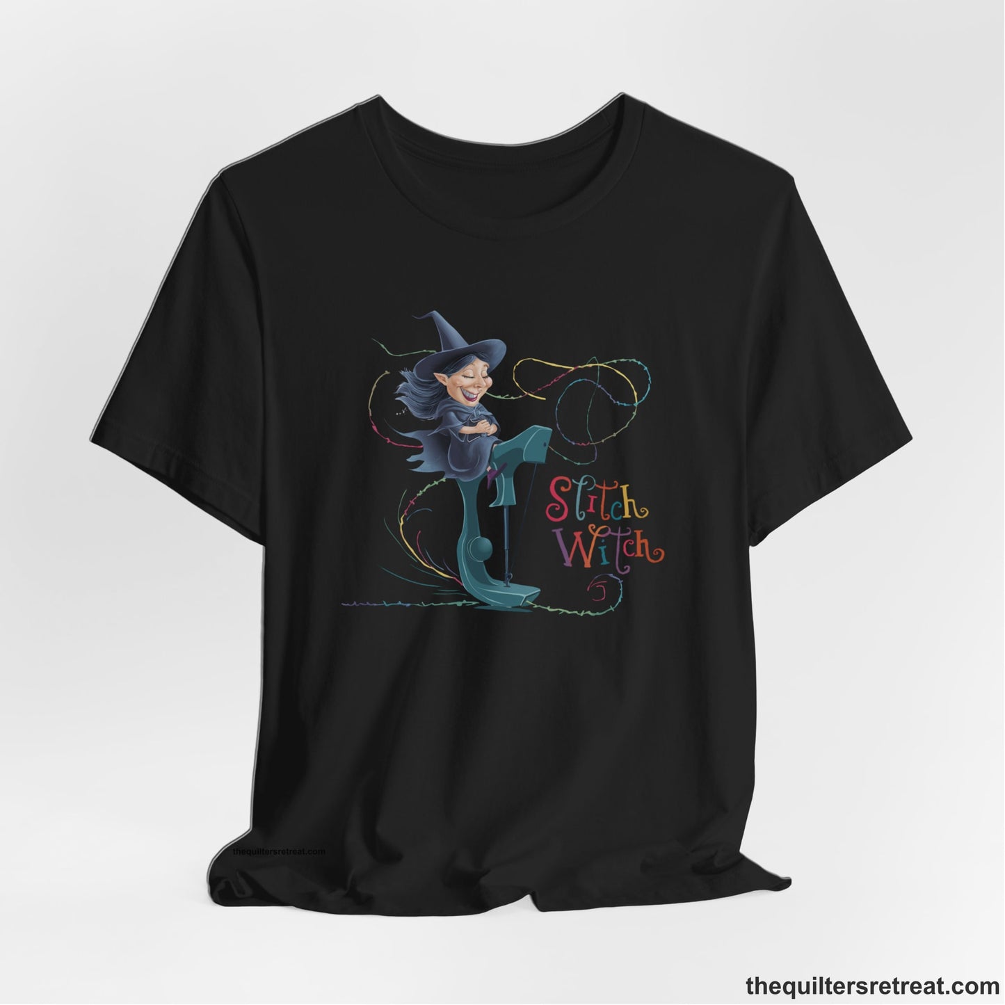 A Black Short Sleeve T-Shirt with a witch on vintage sewing machine with "Stitch Witch" text in playful, colorful style