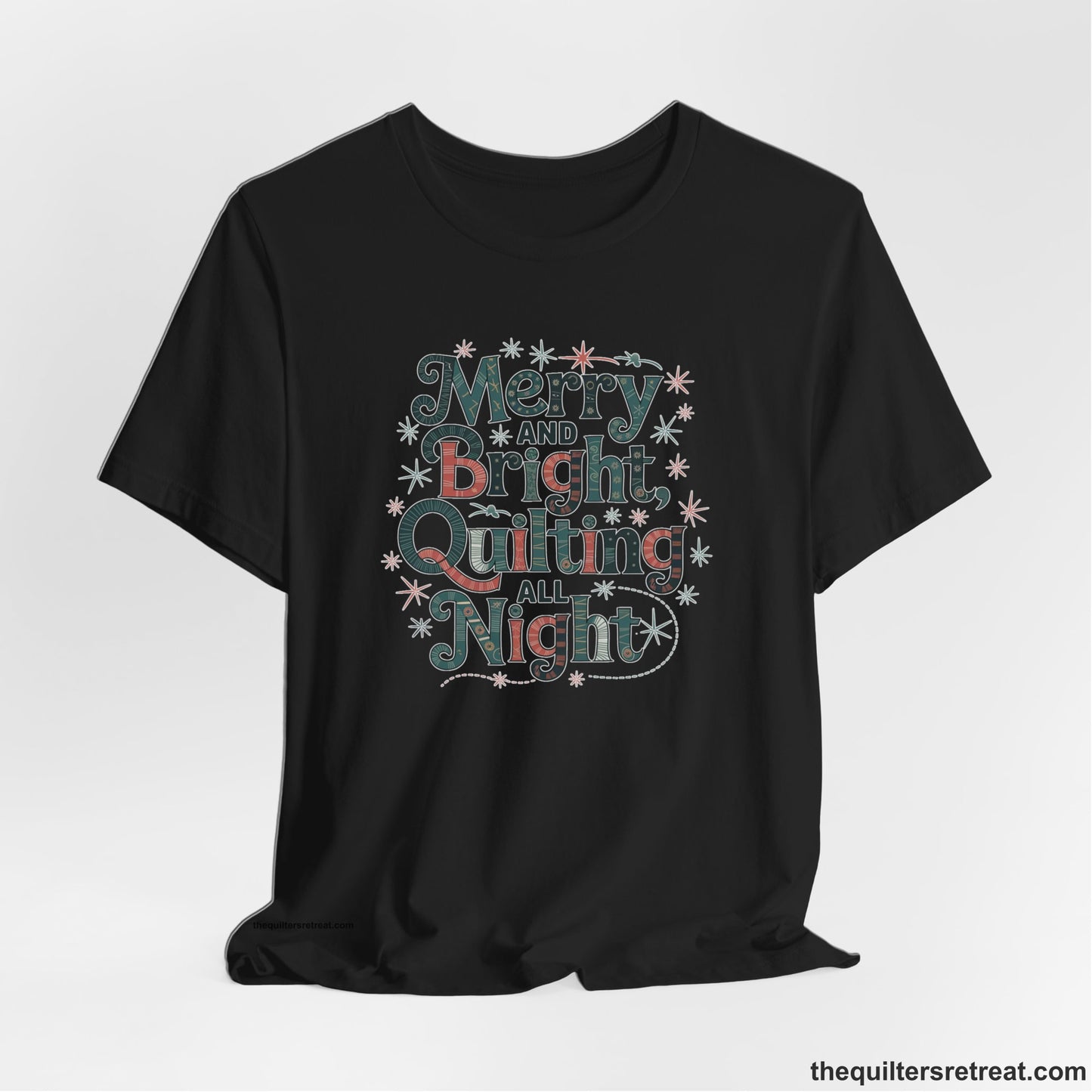 A Black Short Sleeve T-Shirt with a Merry and Bright Quilting All Night text with festive patterns and stars in a whimsical style