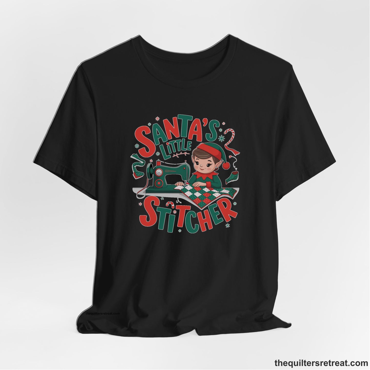 A Black Short Sleeve T-Shirt with a santa's little stitcher elf sewing quilt with festive colors in playful style
