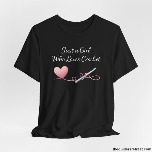 Crochet Gift: A Black Short Sleeve T-Shirt with Heart with crochet hook and yarn, "Just a Girl Who Loves Crochet" text, playful style.