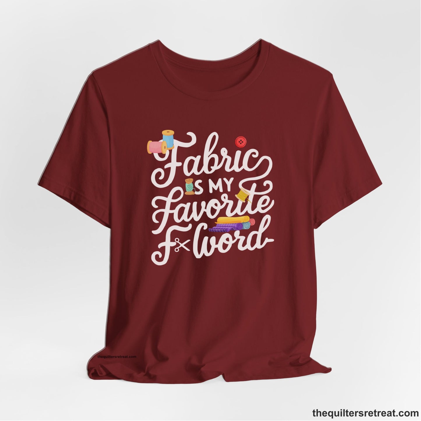 A Cardinal Short Sleeve T-Shirt with a fabric is my favorite f word text with colorful spools and buttons in a playful style