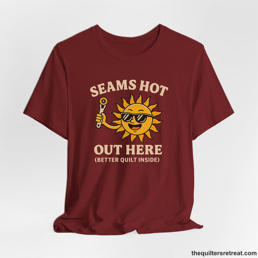 A Cardinal Short Sleeve T-Shirt with a smiling sun with sunglasses holding a pizza cutter in a playful cartoon style