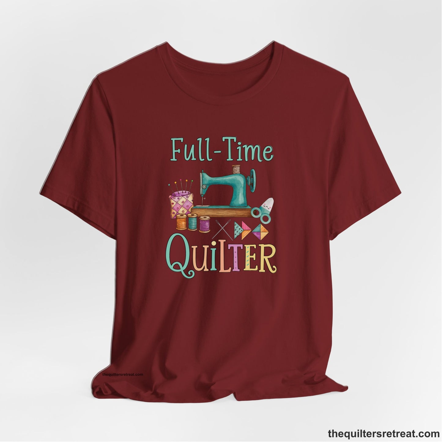 A Cardinal Short Sleeve T-Shirt with a vintage sewing machine with colorful threads and "Full-Time Quilter" text in playful style