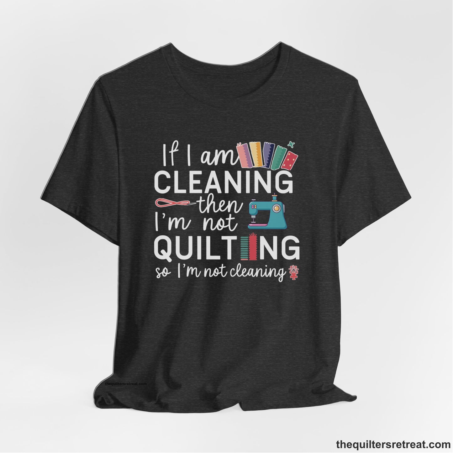 A Dark Grey Heather Short Sleeve T-Shirt with a If I am cleaning then I'm not quilting text with sewing machine and fabric graphics