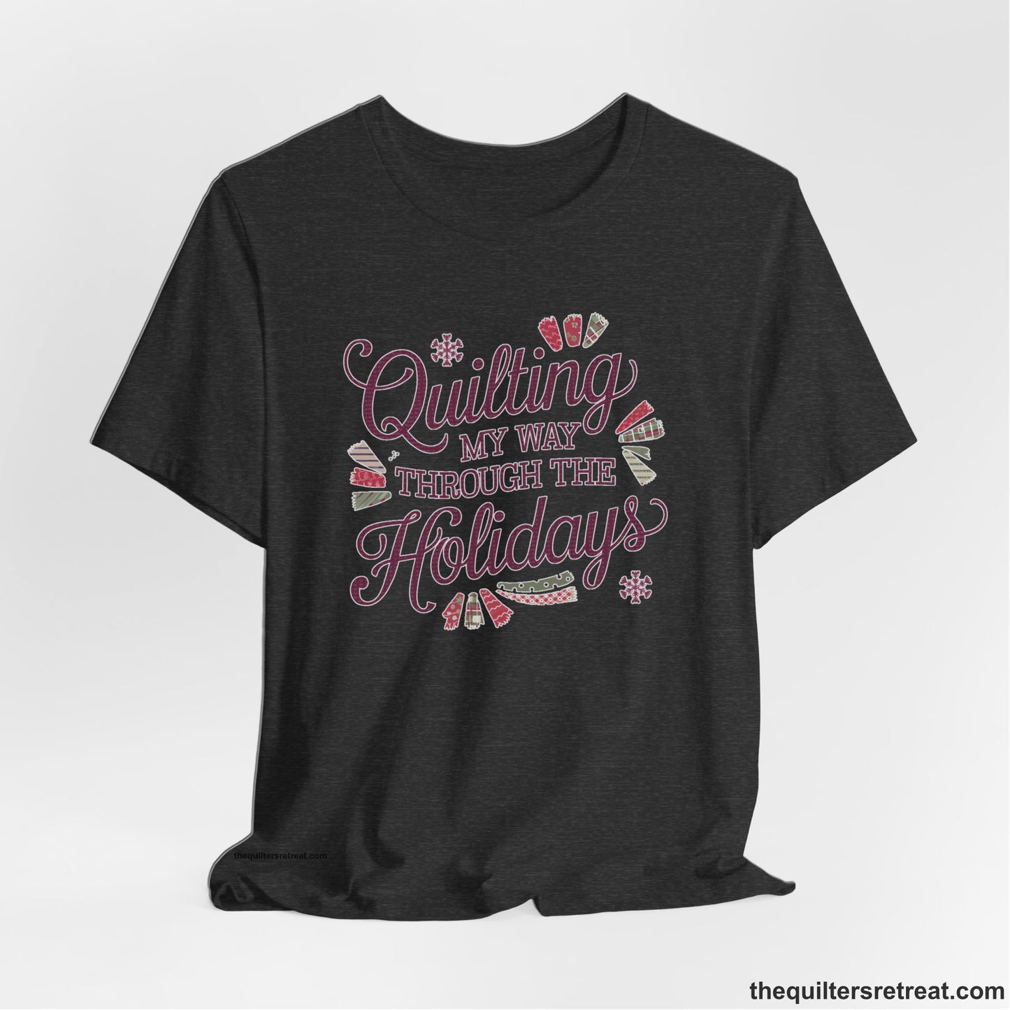 A Dark Grey Heather Short Sleeve T-Shirt with a quilting-themed text in festive colors with decorative quilt patterns