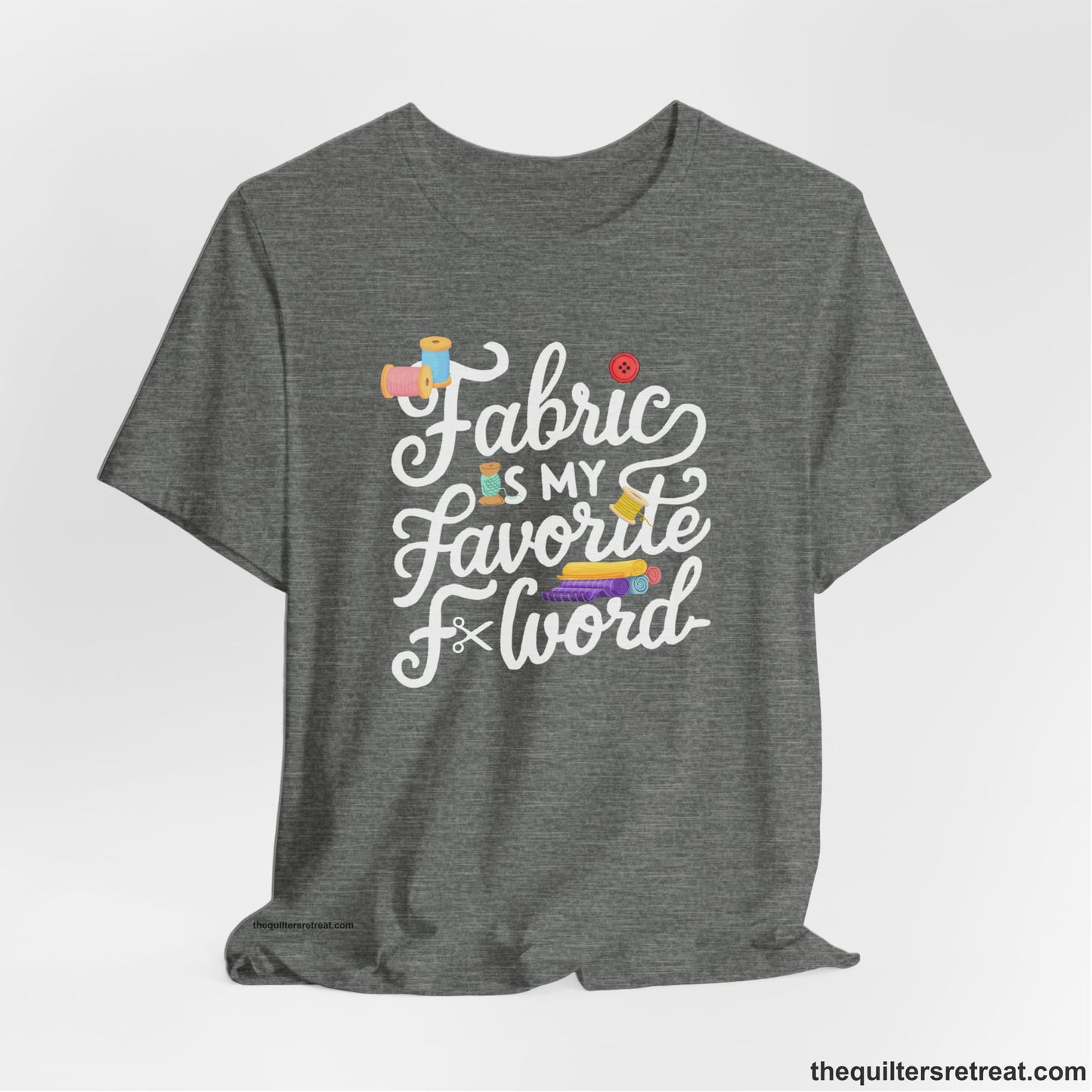 A Deep Heather Short Sleeve T-Shirt with a fabric is my favorite f word text with colorful spools and buttons in a playful style