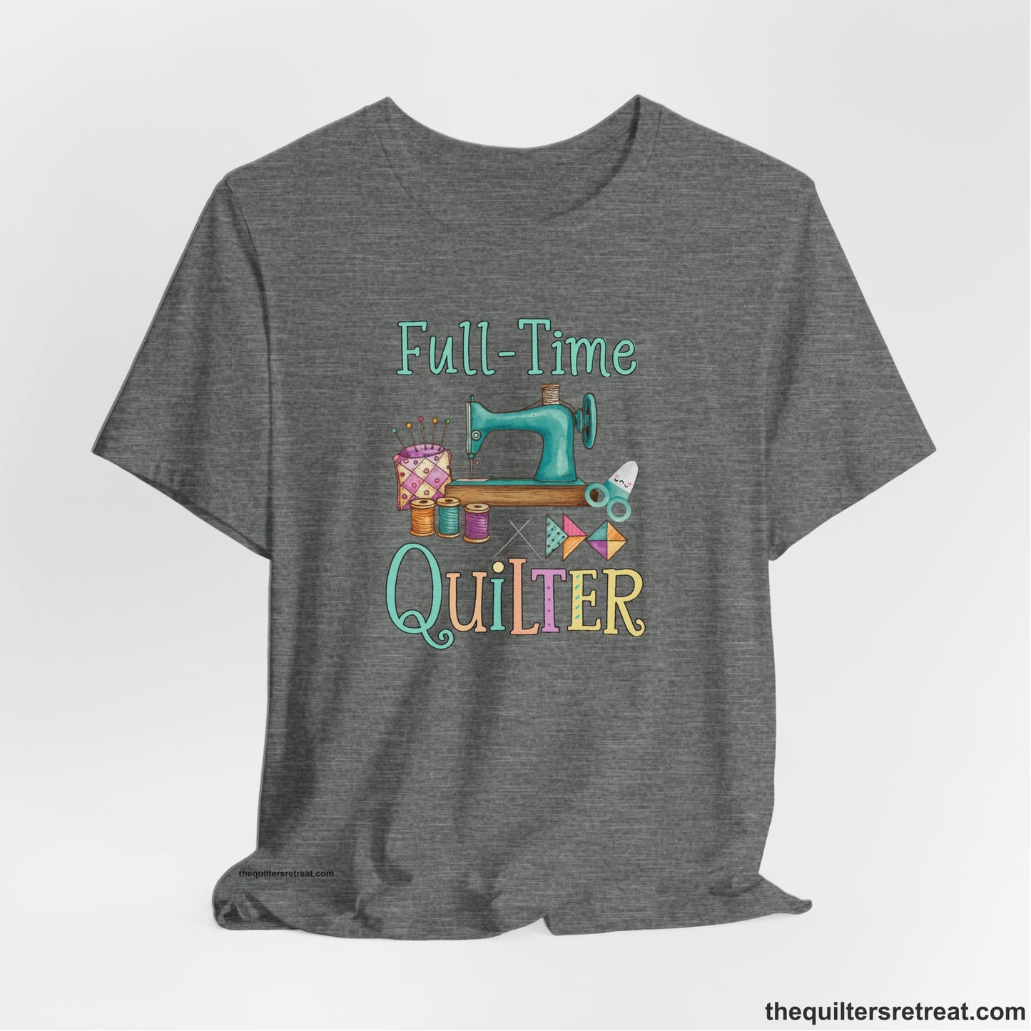 A Deep Heather Short Sleeve T-Shirt with a vintage sewing machine with colorful threads and "Full-Time Quilter" text in playful style