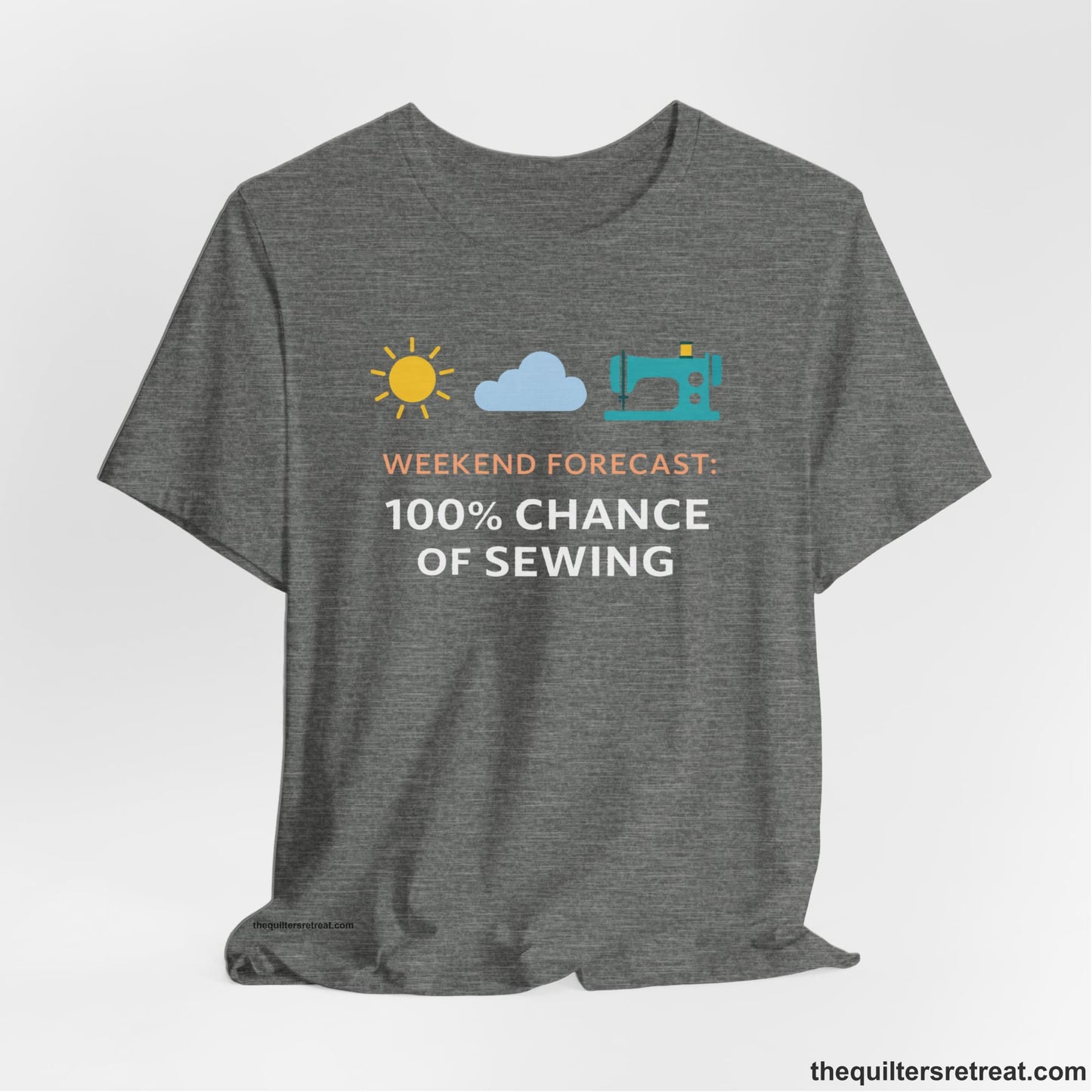 A Deep Heather Short Sleeve T-Shirt with a Sun, cloud, sewing machine icons; bold text "Weekend Forecast: 100% Chance of Sewing"; playful style.
