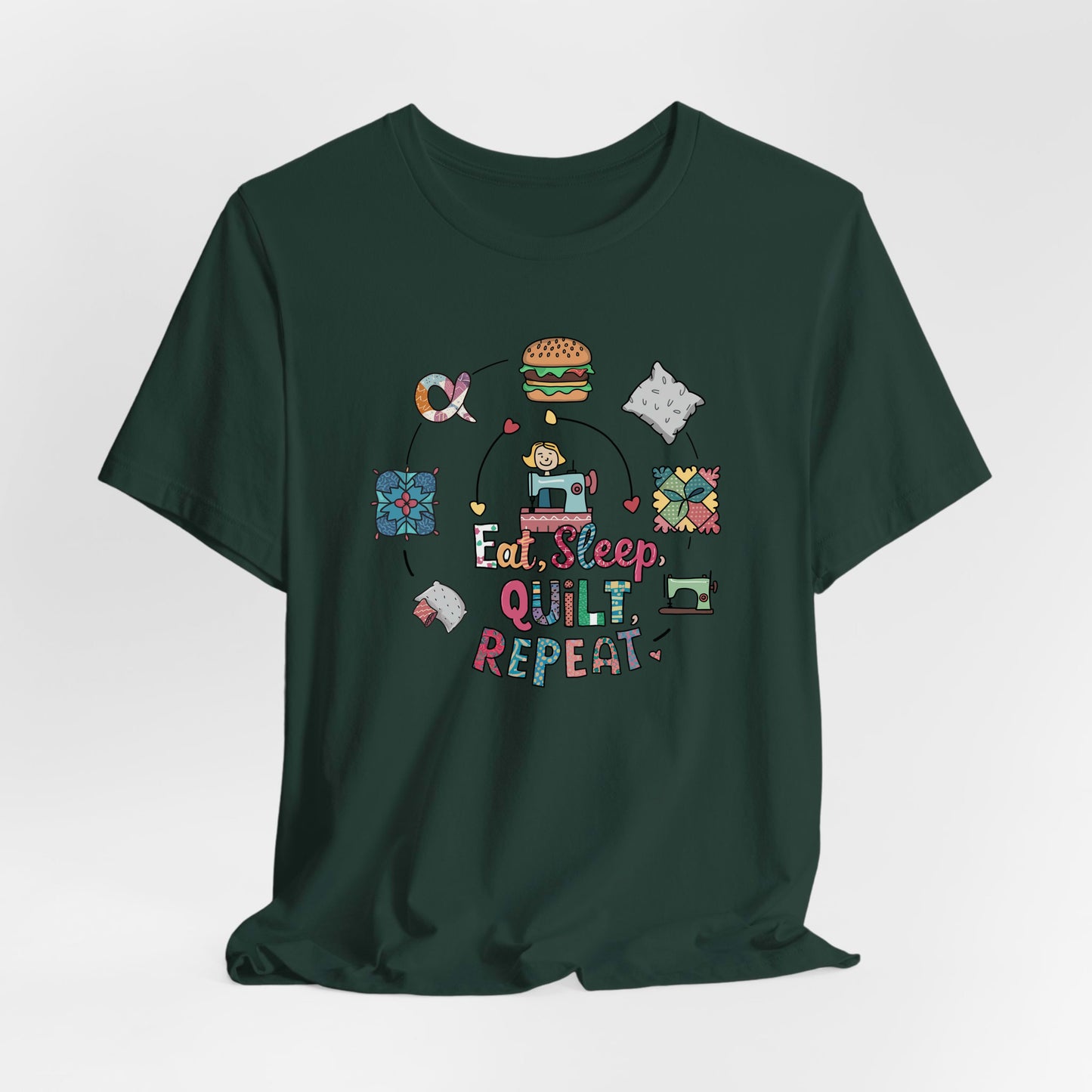 A Forest Short Sleeve T-Shirt with a cute quilting elements with "Eat, Sleep, Quilt, Repeat" text in playful style