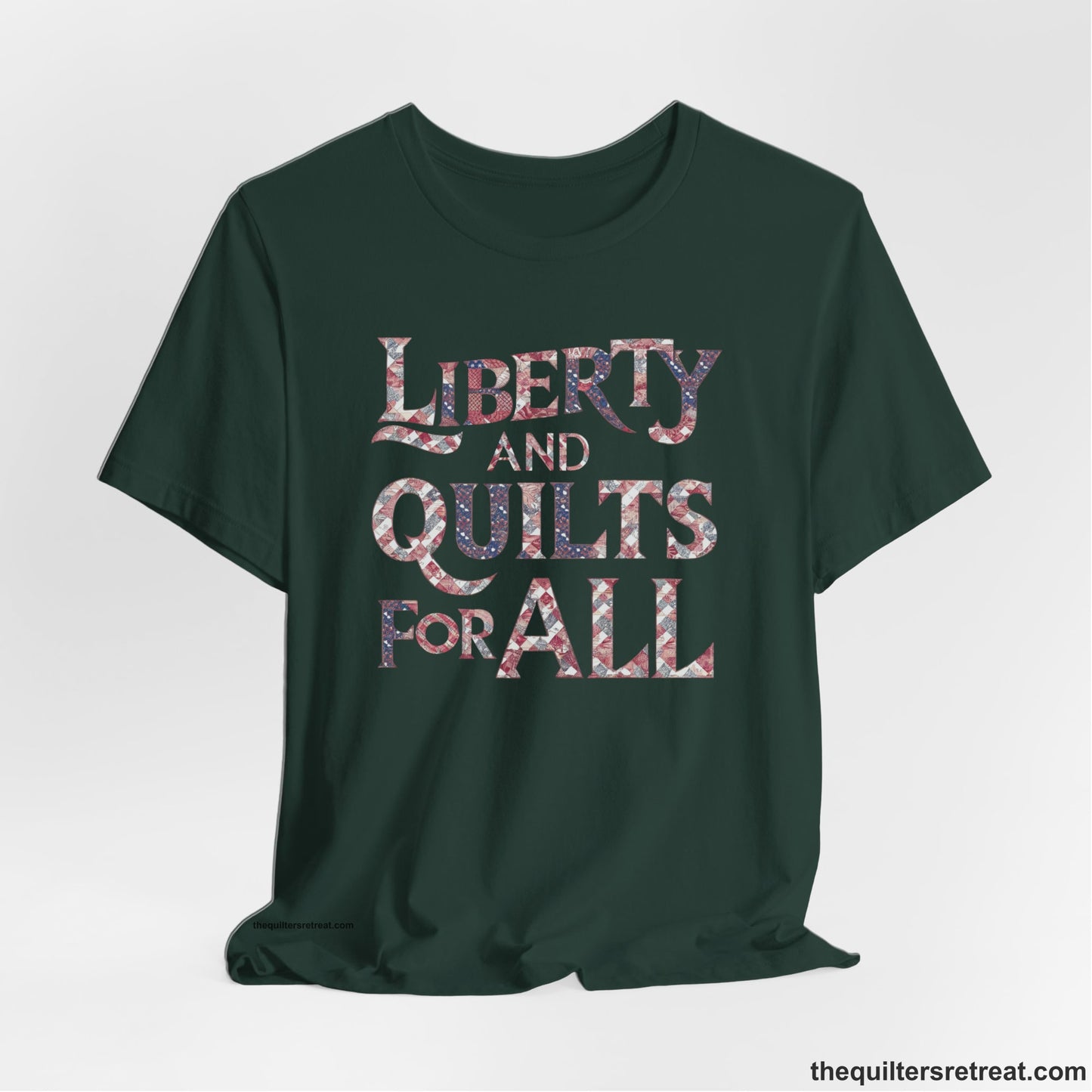 A Forest Short Sleeve T-Shirt with a Liberty and Quilts for All" text with patchwork quilt pattern in a vintage style